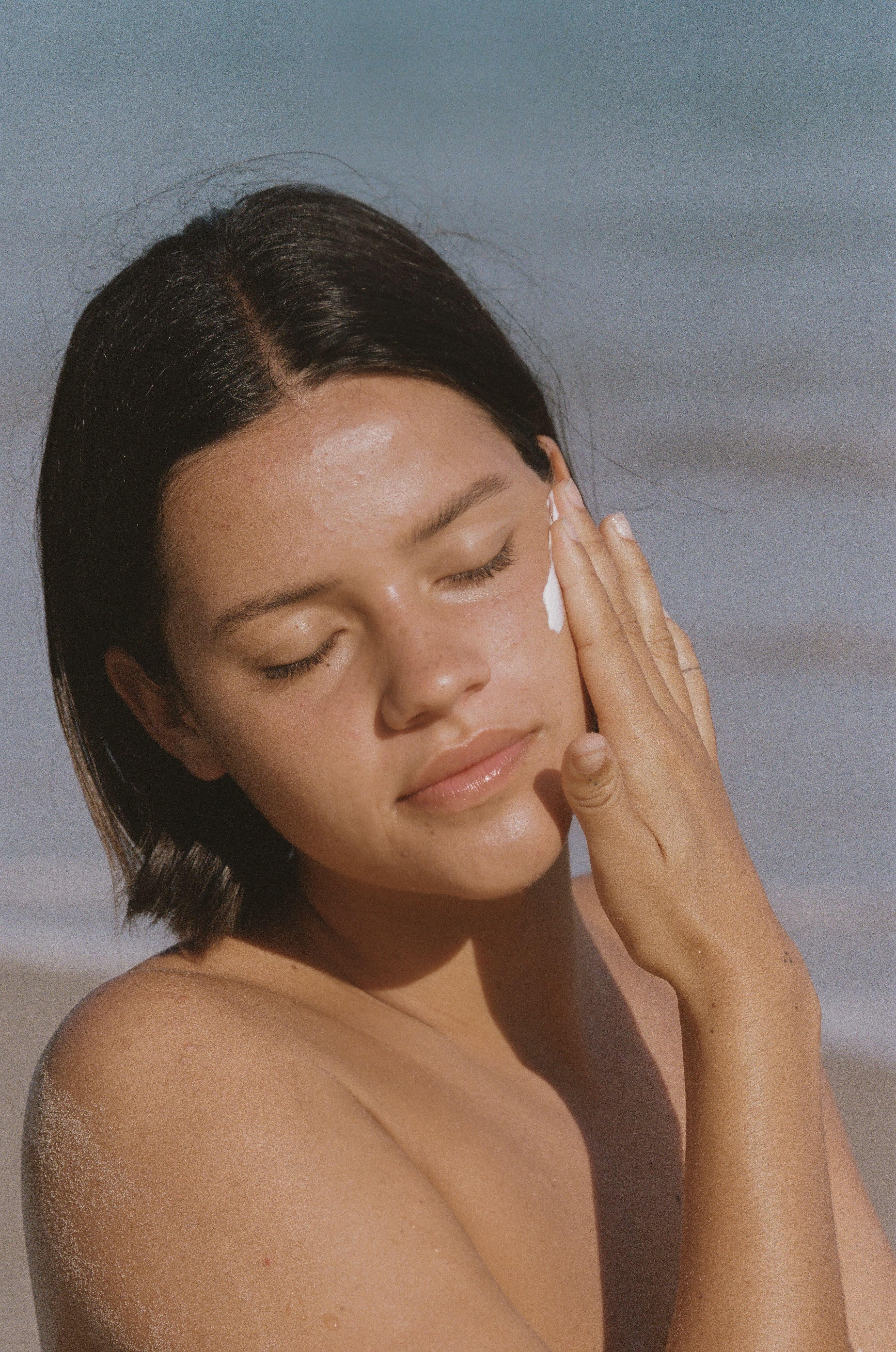 Sun Juju Mineral Based SPF50 Sunscreen Cream applied to face