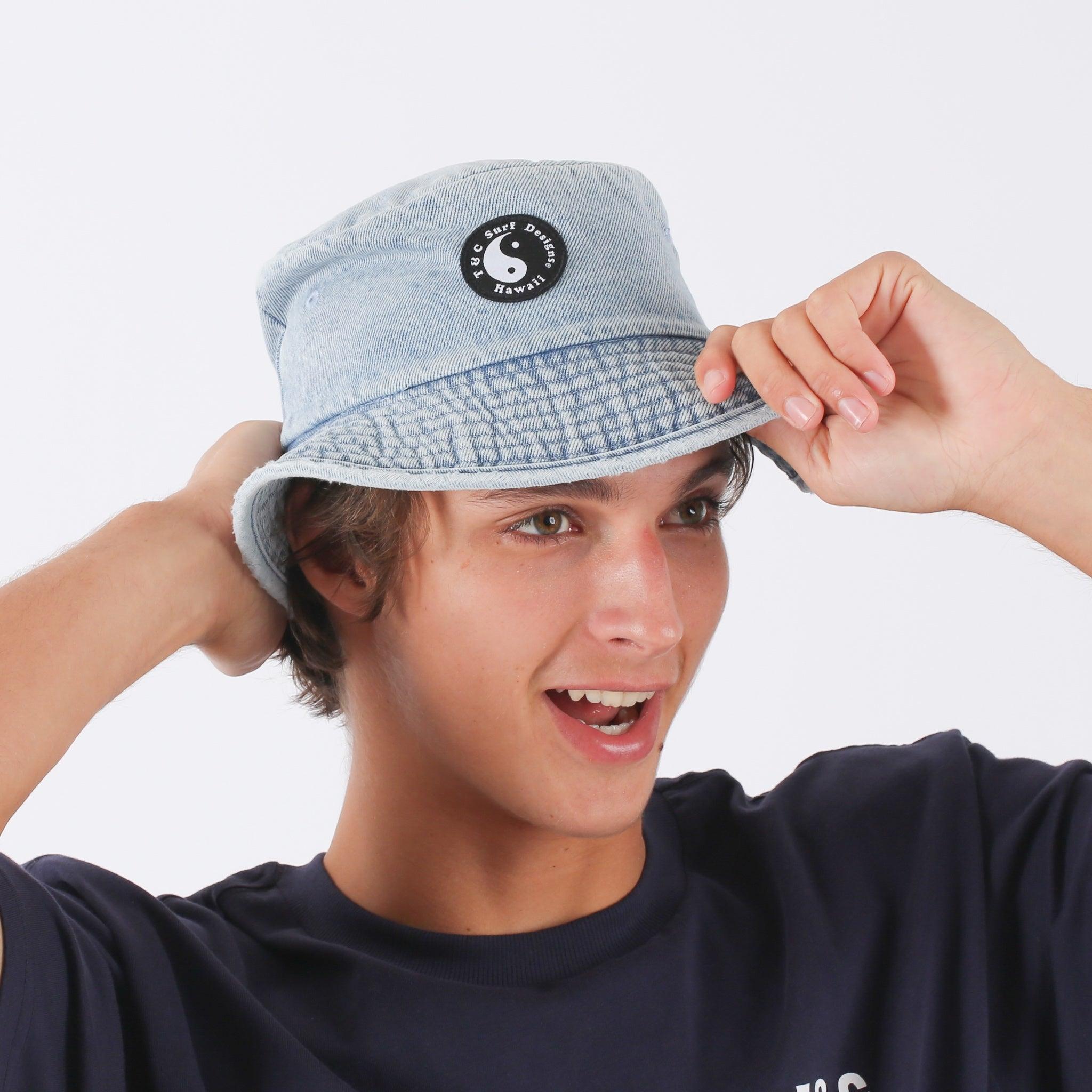 Model wearing bucket hat
