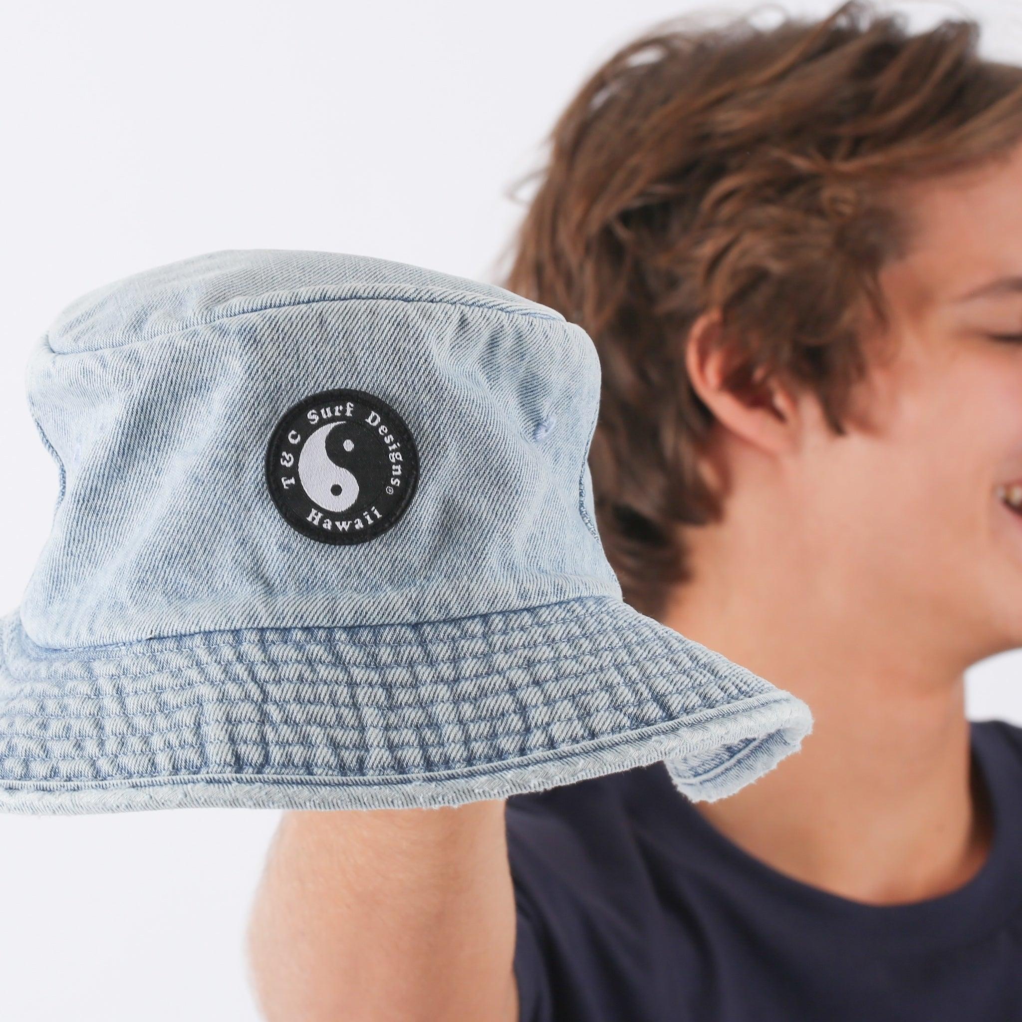 Hat held by model