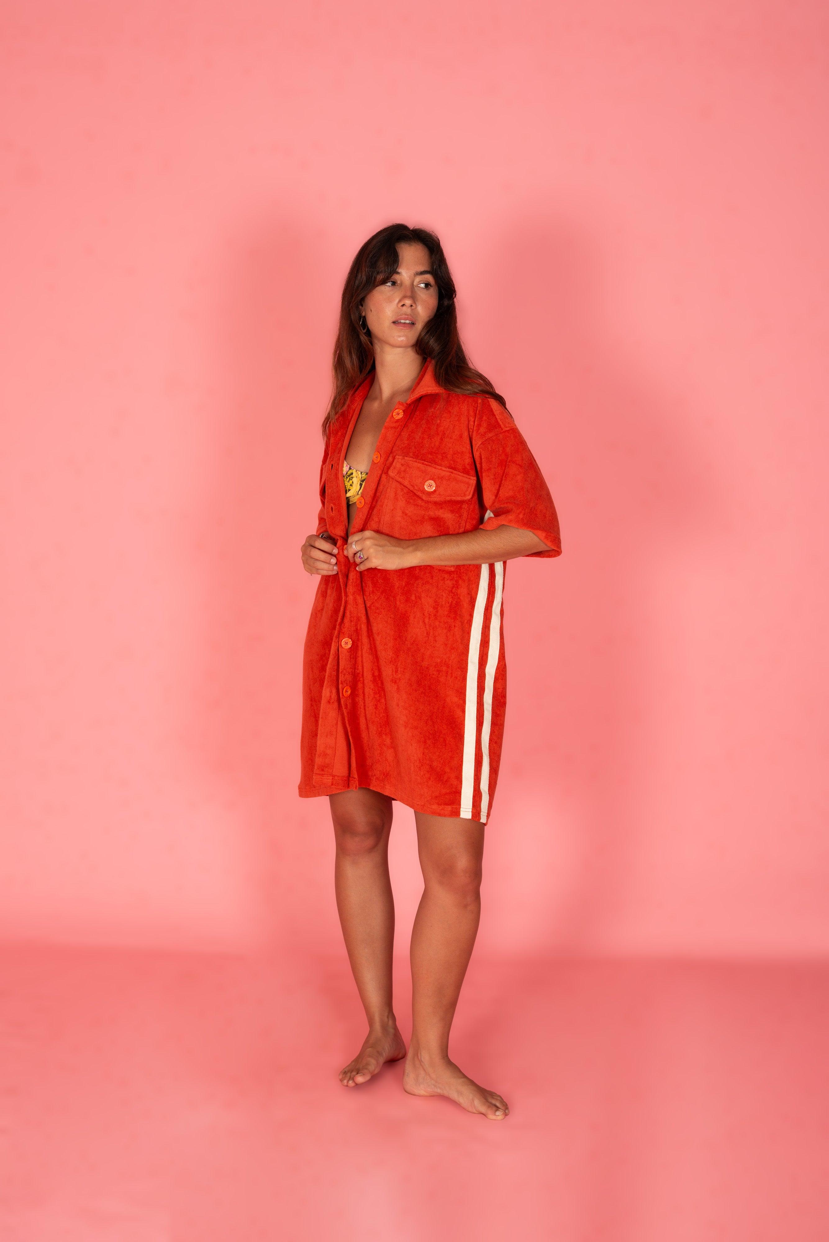 Model adjusting Après Surf Dress