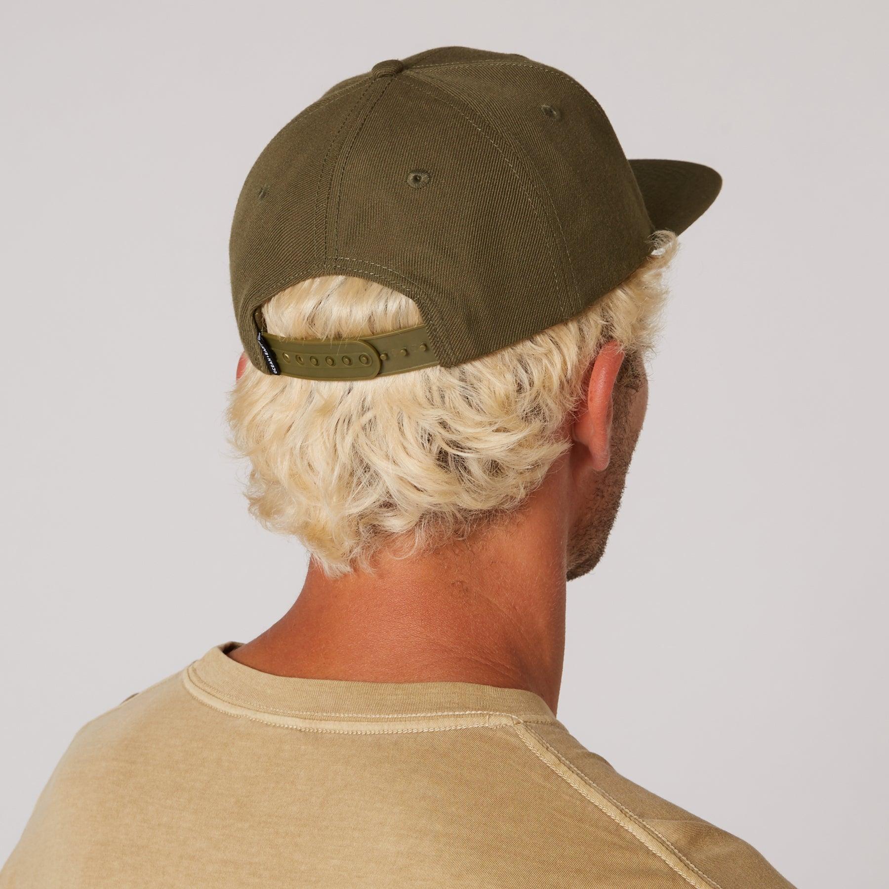 Olive cap worn front