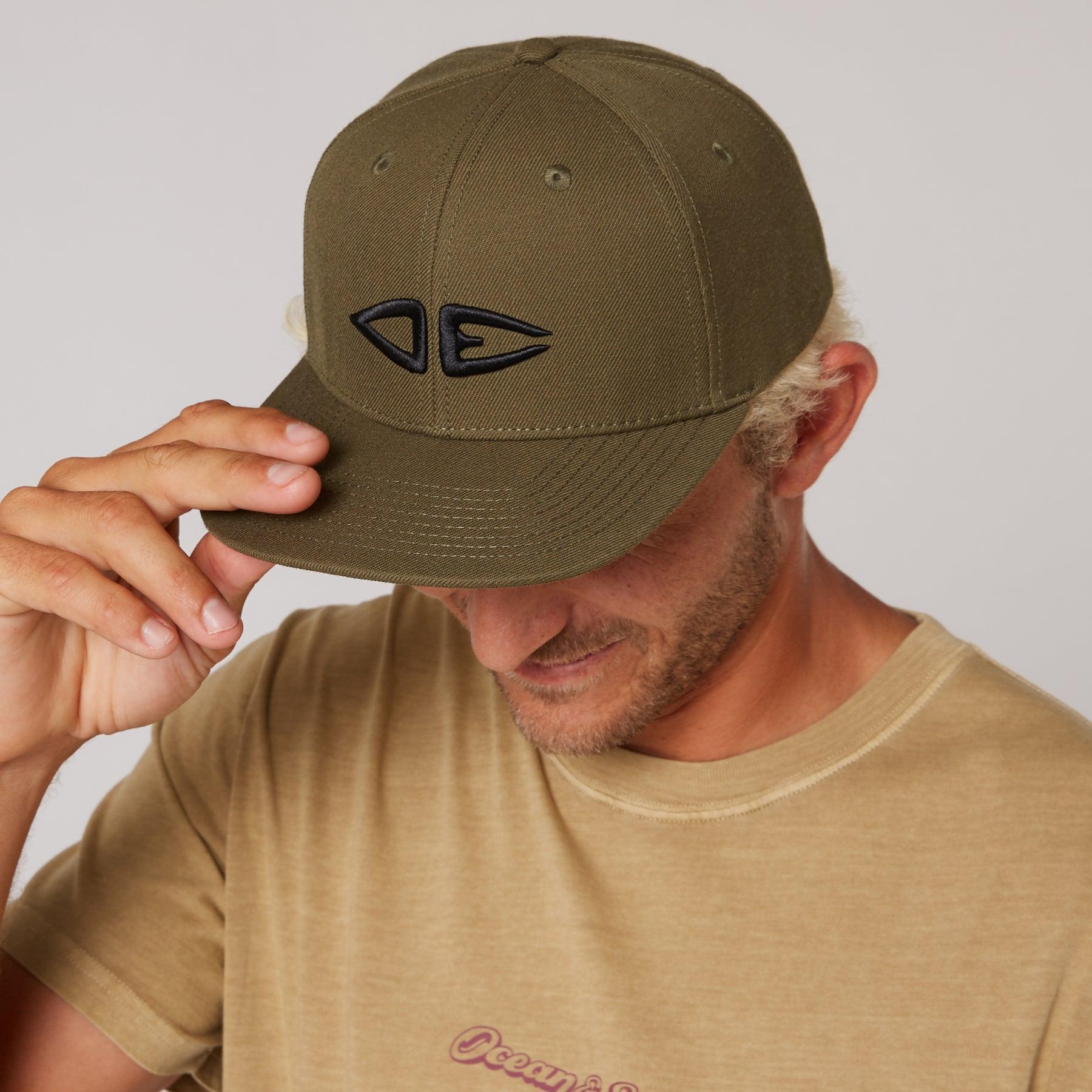Olive cap worn back