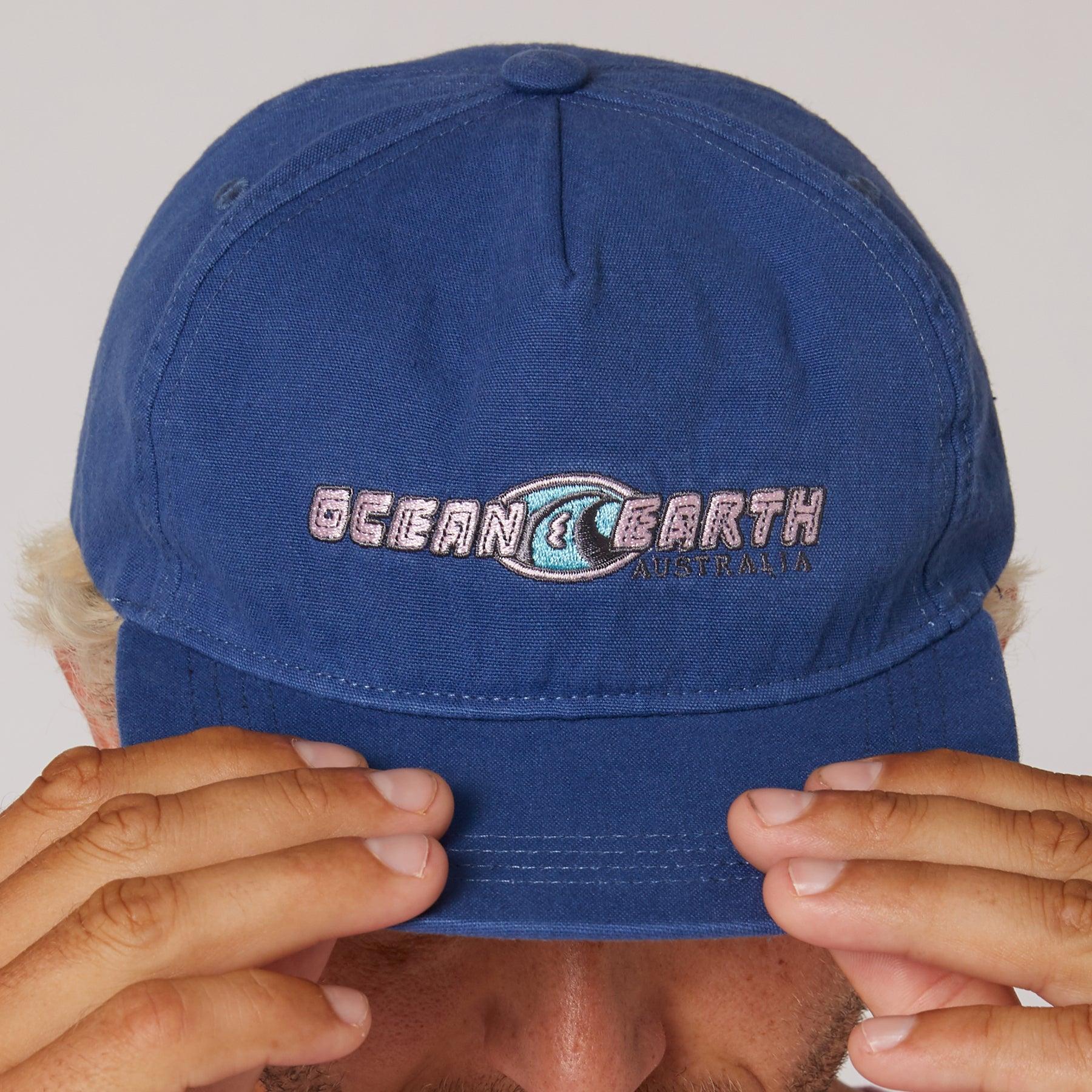 Close-up of Denim Blue cap logo