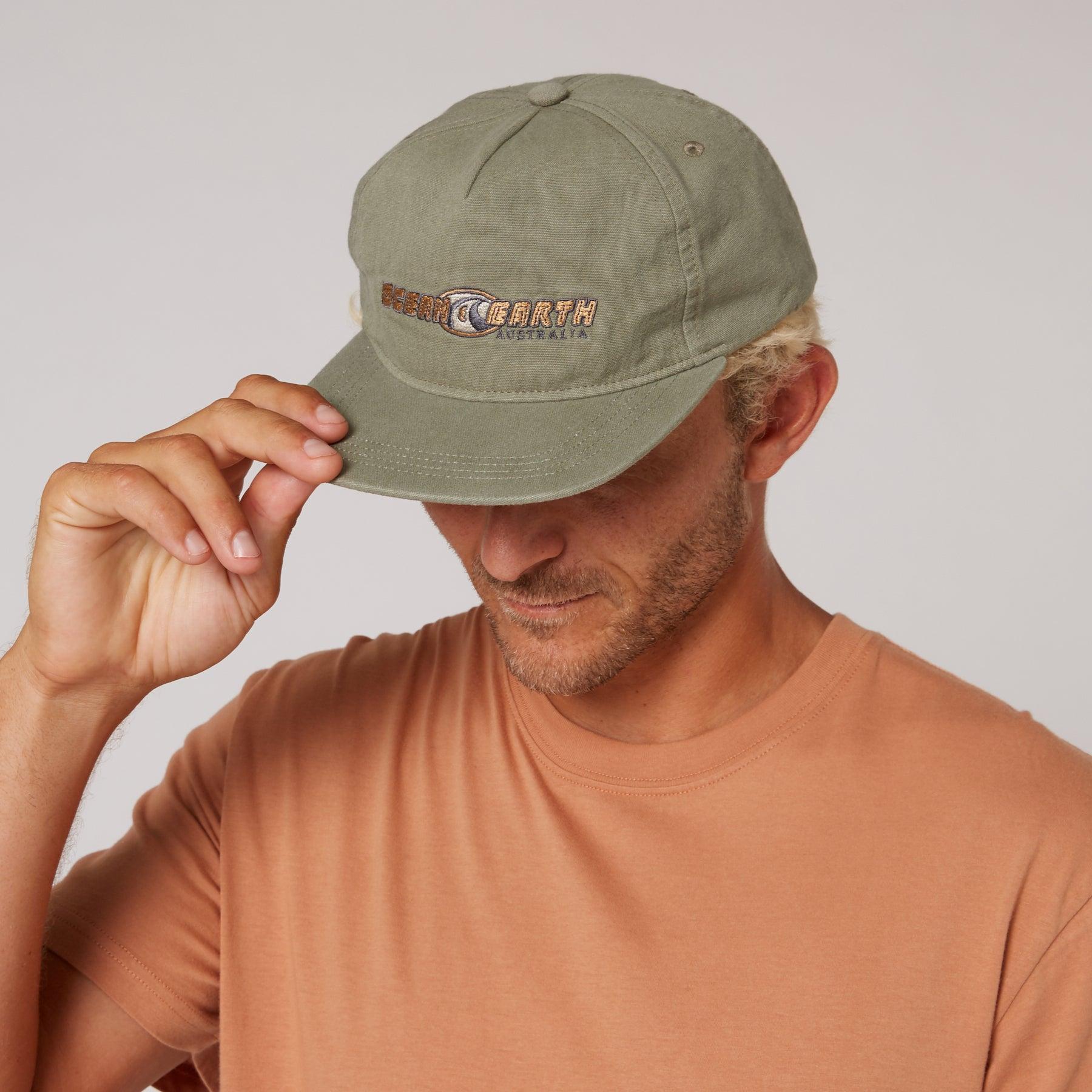Person wearing Olive Nineties Wave Cap