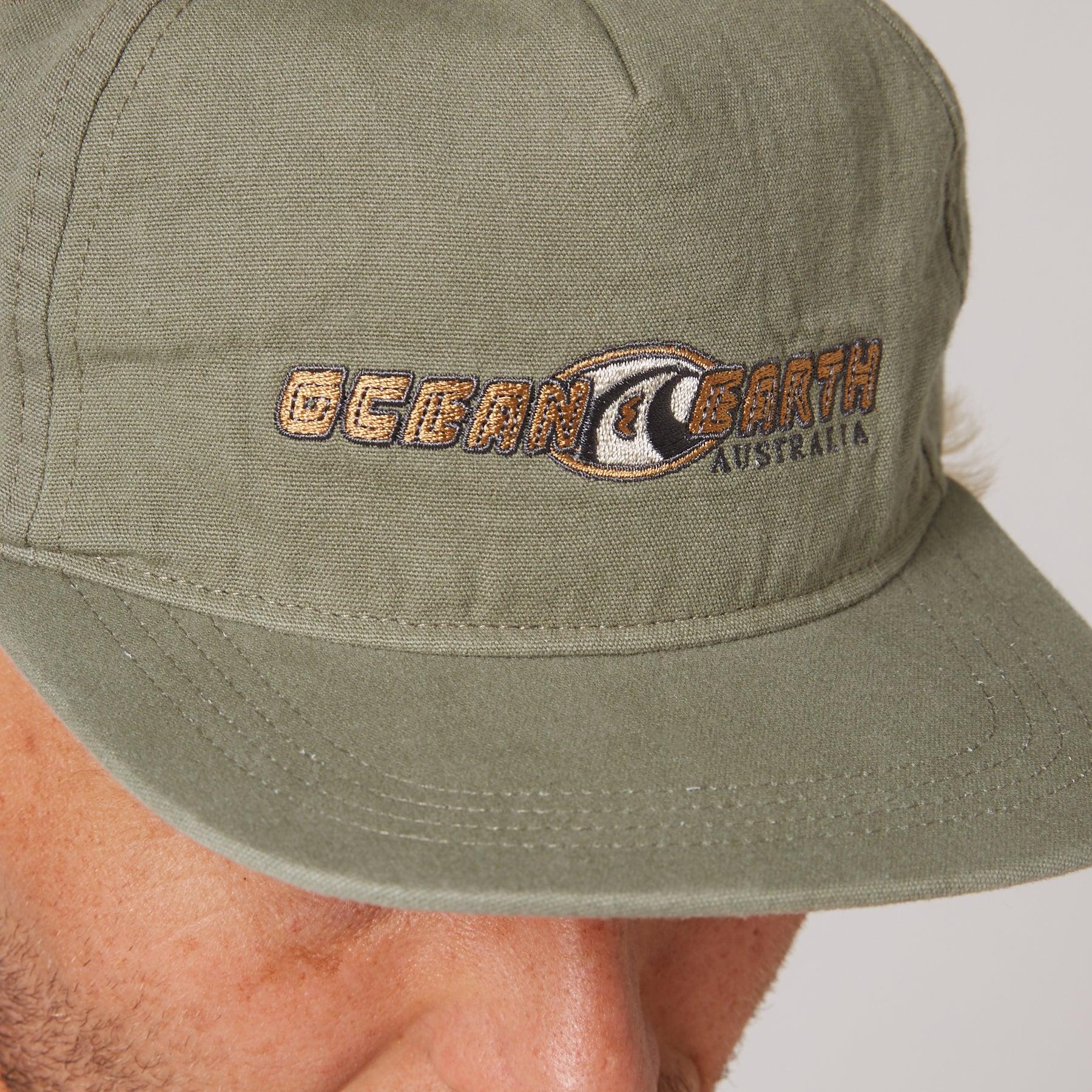 Close-up of Olive cap logo