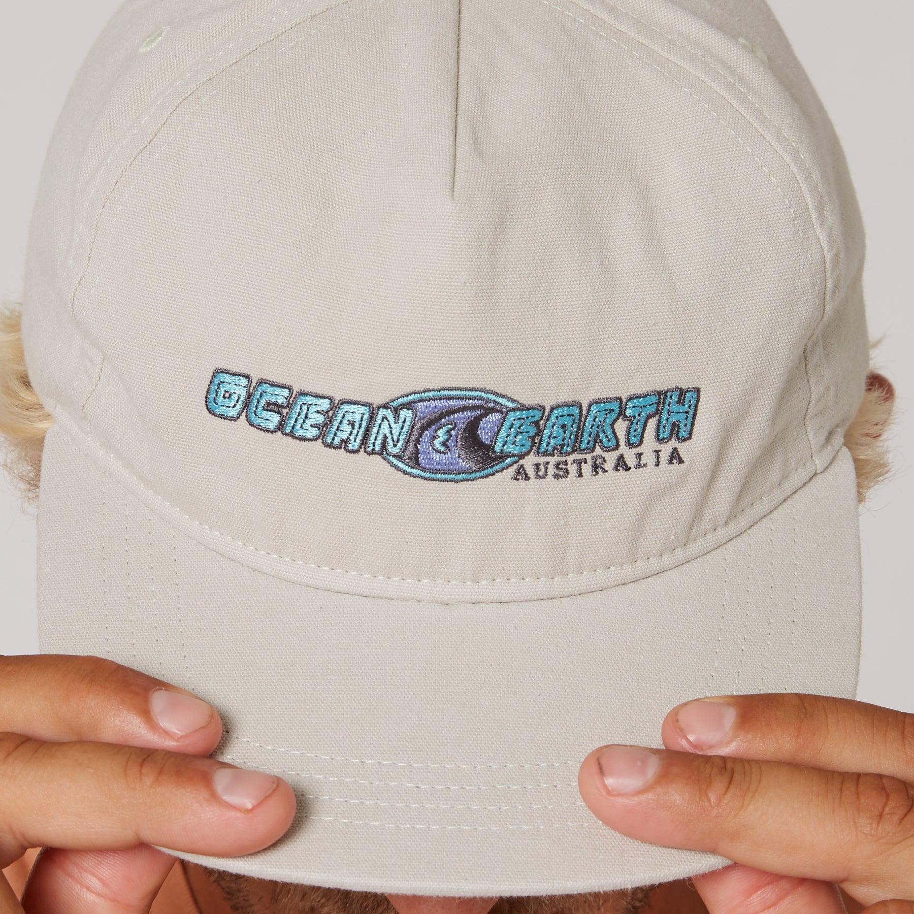 Close-up of Vintage White cap logo