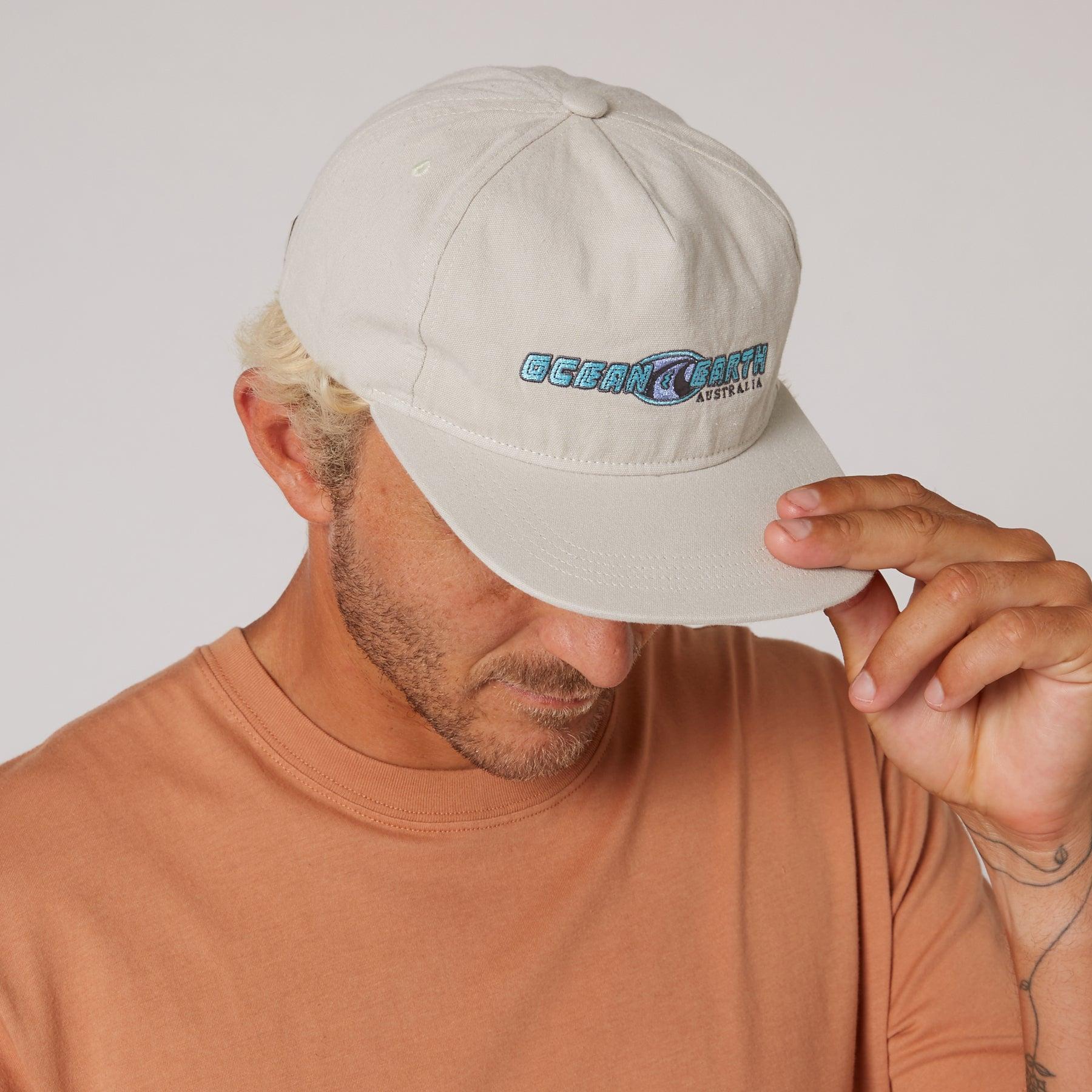 Person wearing Vintage White cap