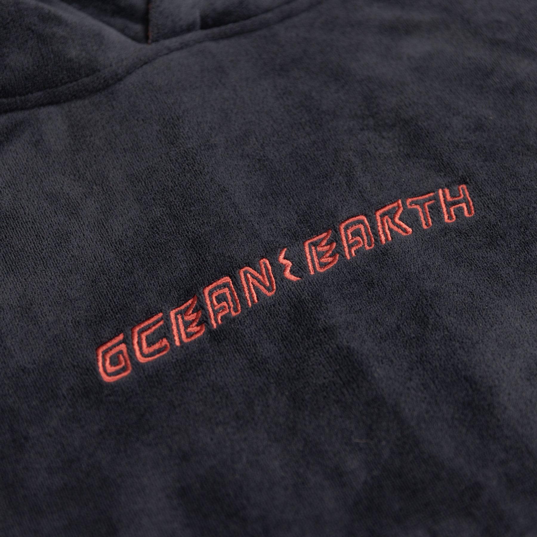 Close-up of dull black poncho