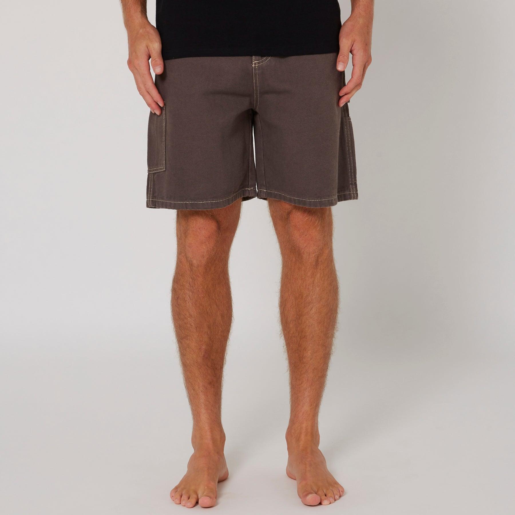 Close-up of grey shorts pocket