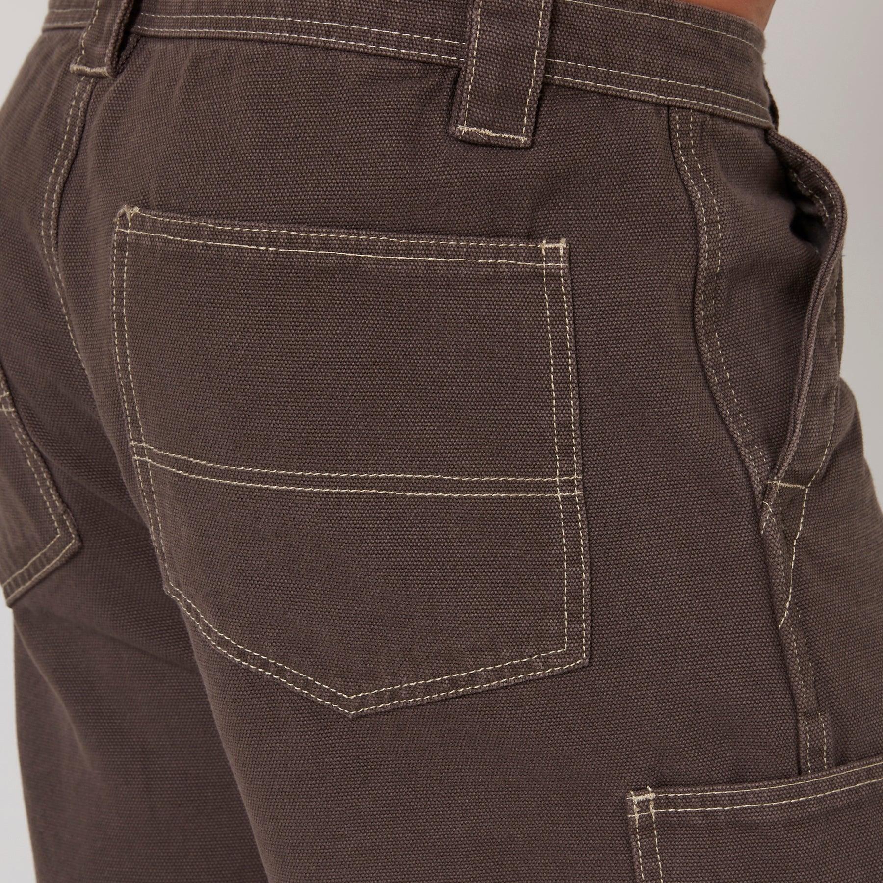 Close-up of grey shorts stitching