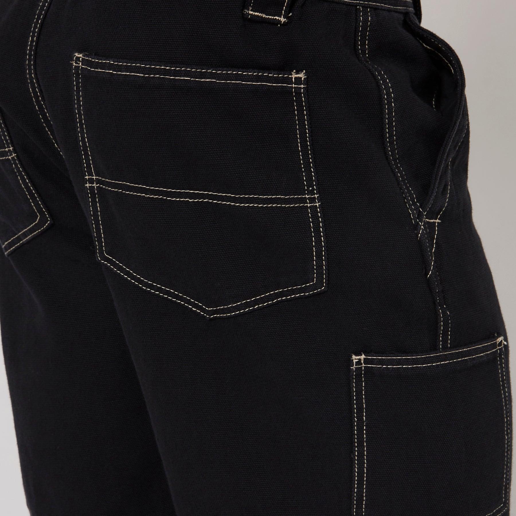 Close-up of black shorts pocket