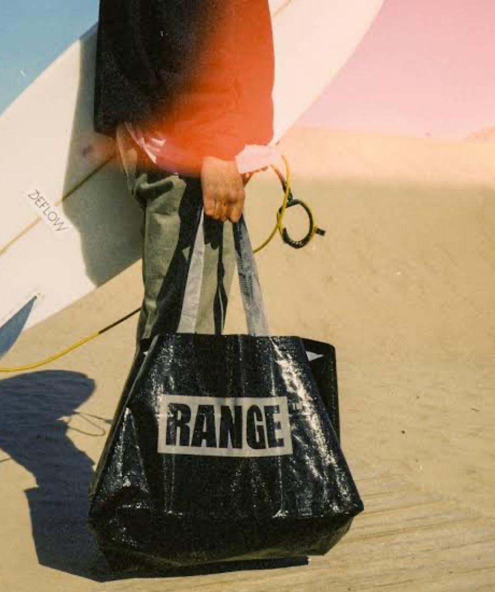 Beach bag with surfboard