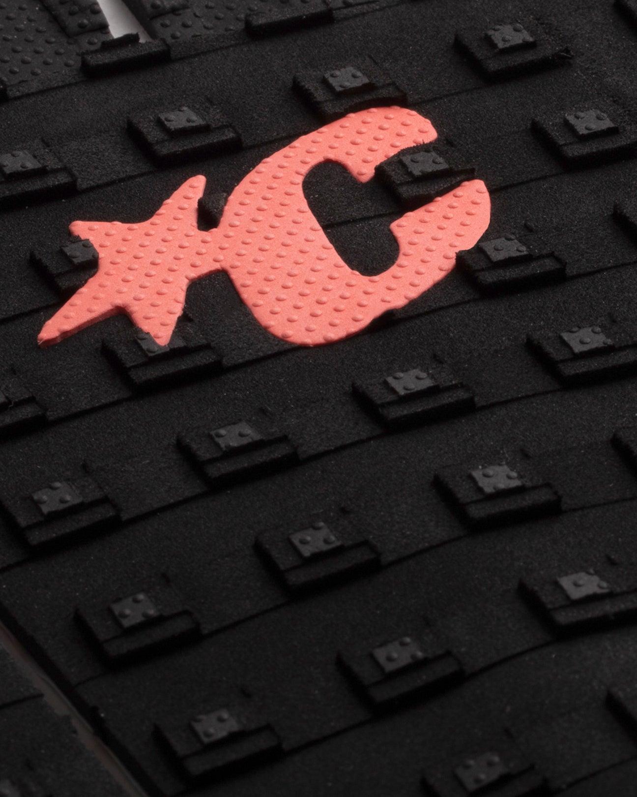 Close-up of logo on red traction pad