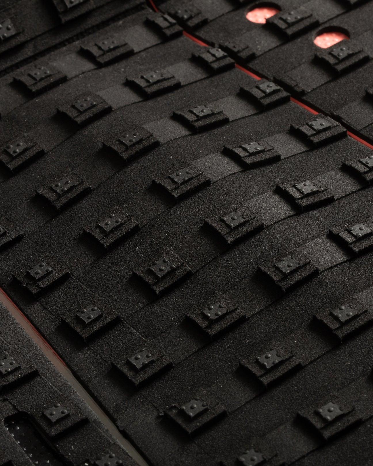 Close-up of red traction pattern