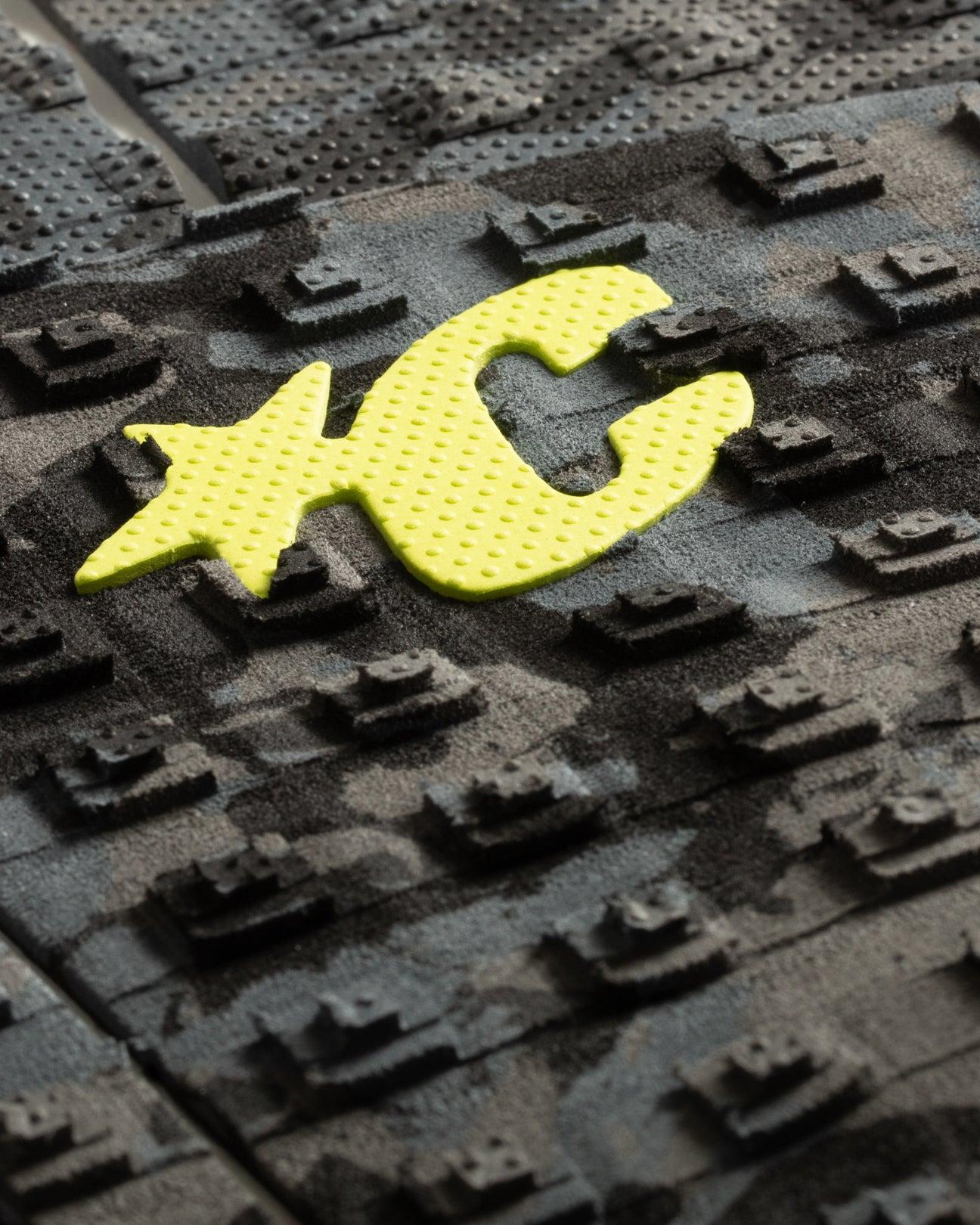 Close-up of logo on camo pad
