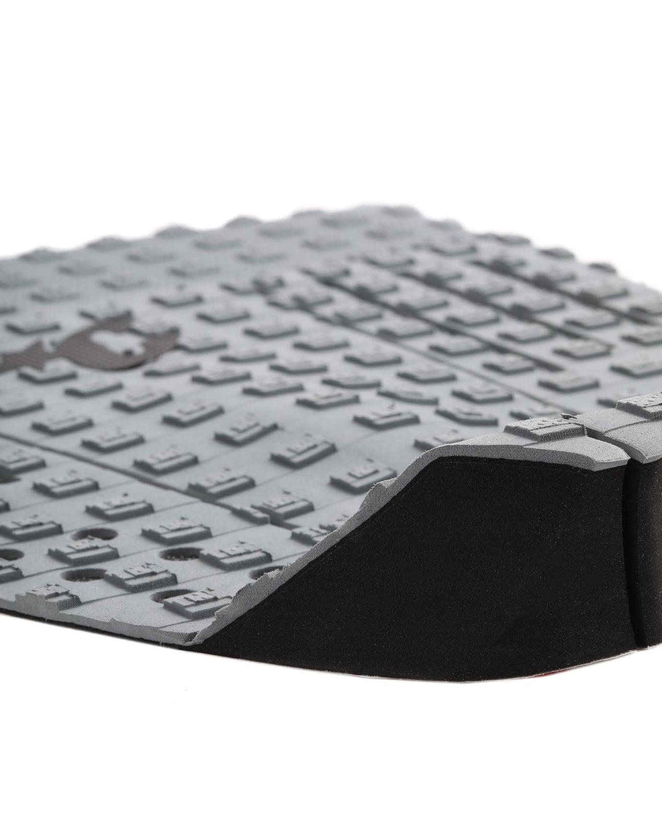 Side view of grey traction pad