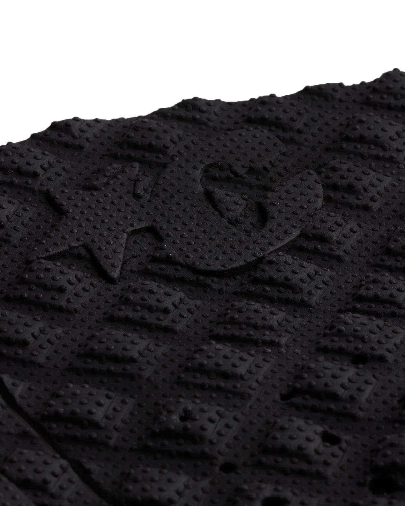 Close-up of logo on traction pad