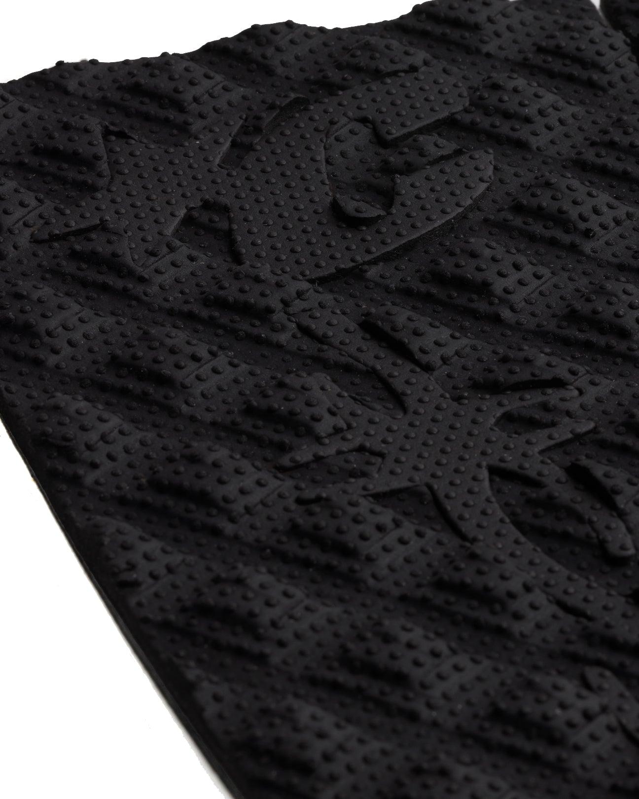 Close-up of logo on traction pad