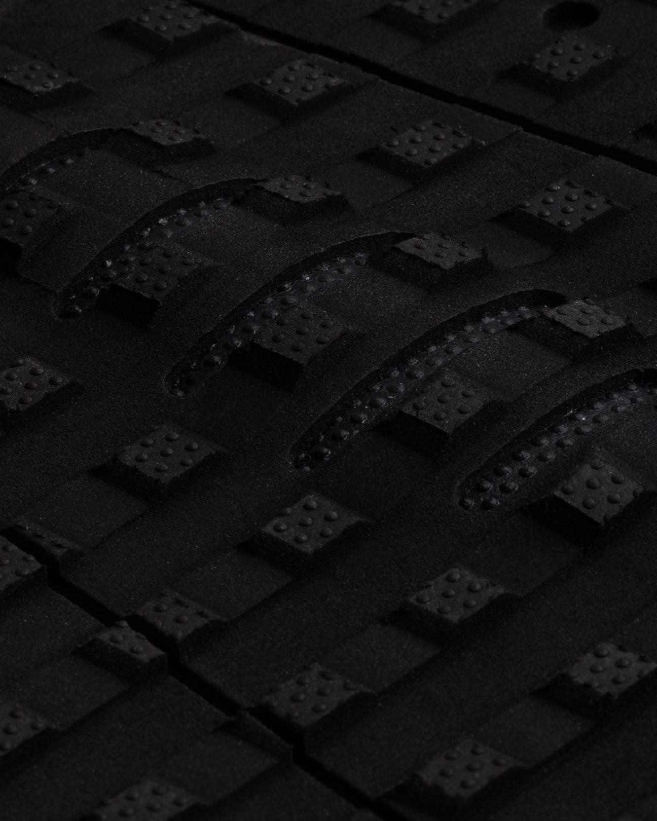 Black Fluro Red traction pattern