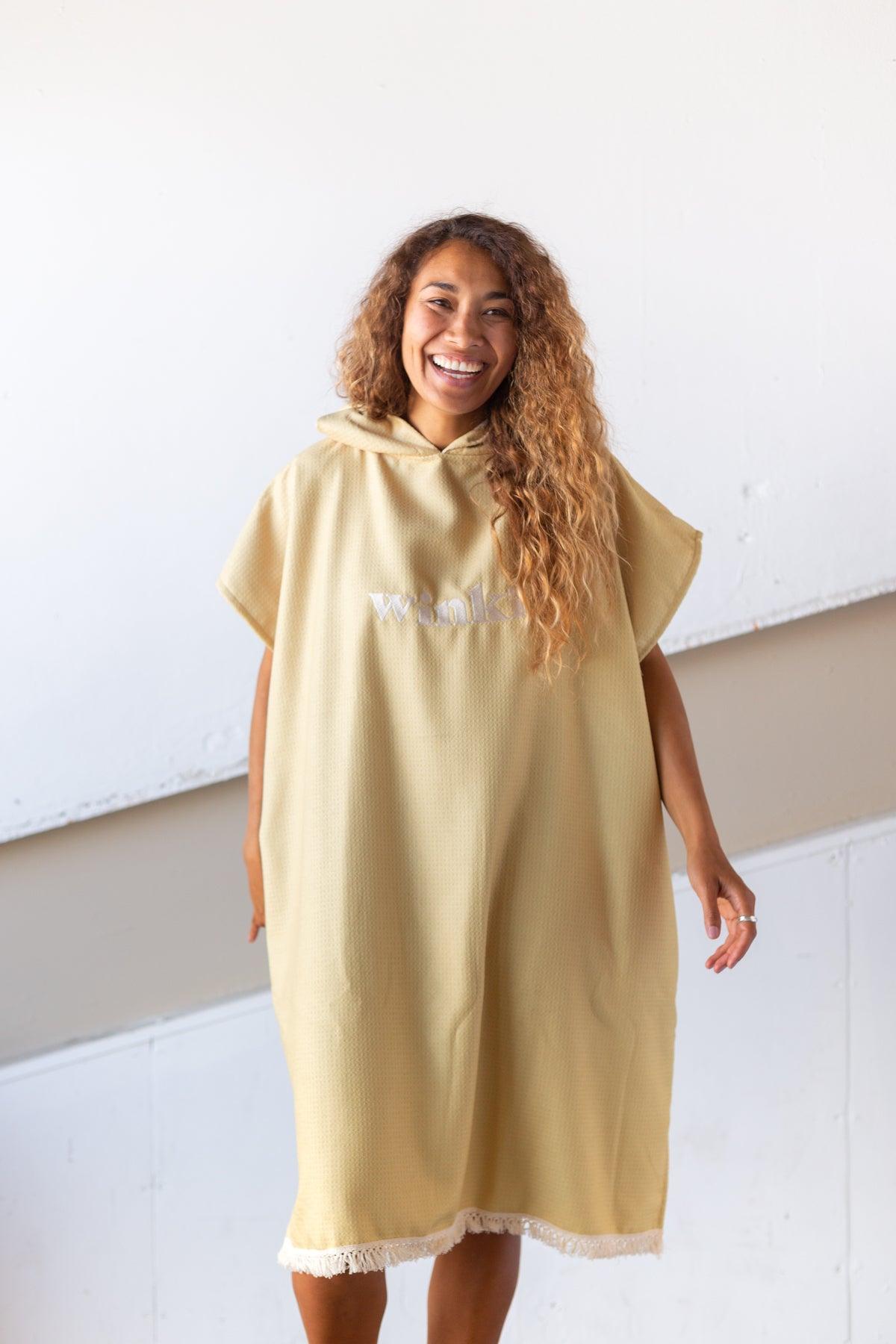 Close-up of mustard hooded towel