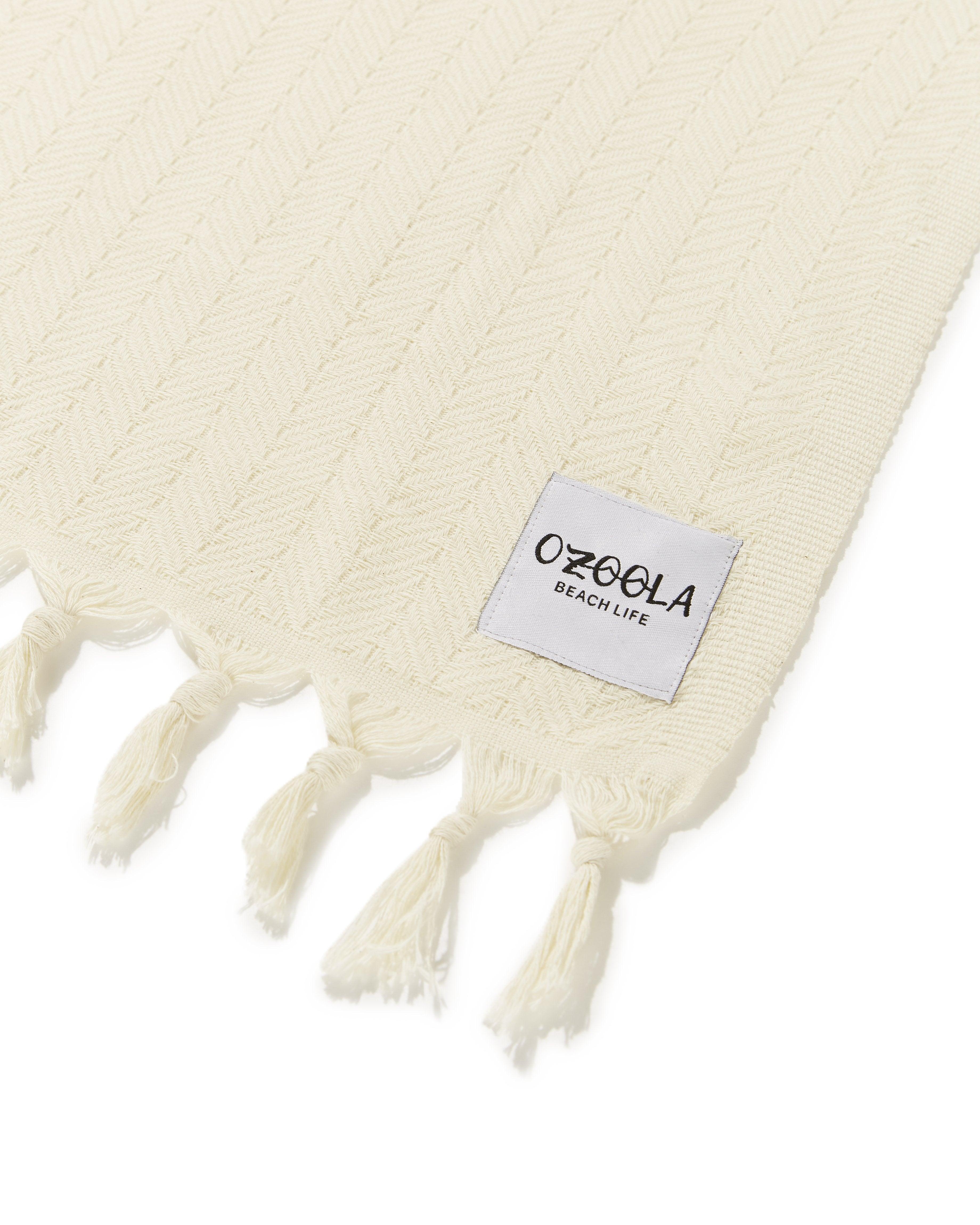 Lifestyle image of beach blanket