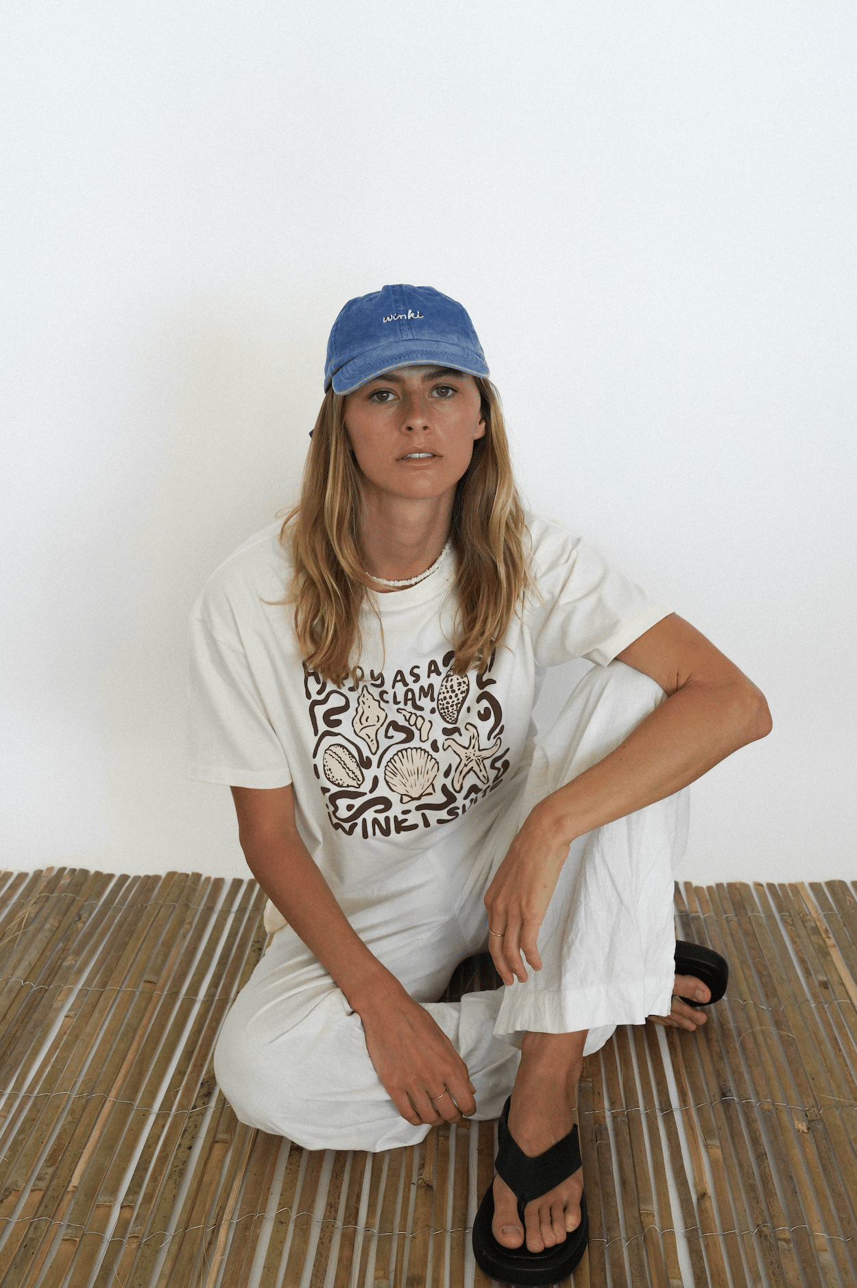 Clam Tee seated view