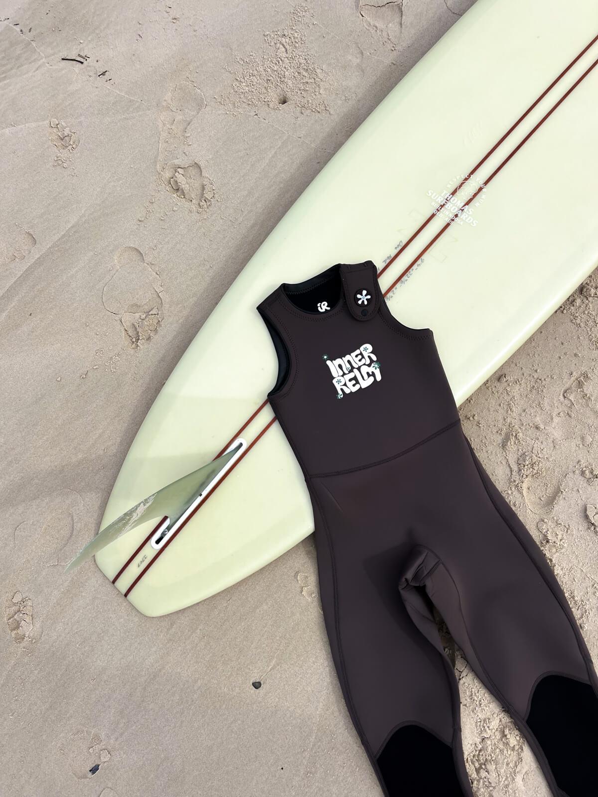 Wetsuit with surfboard