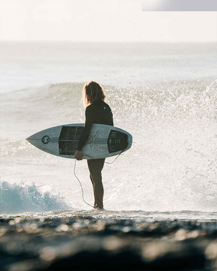 Seam Mawson surfing by Ocean and Earth