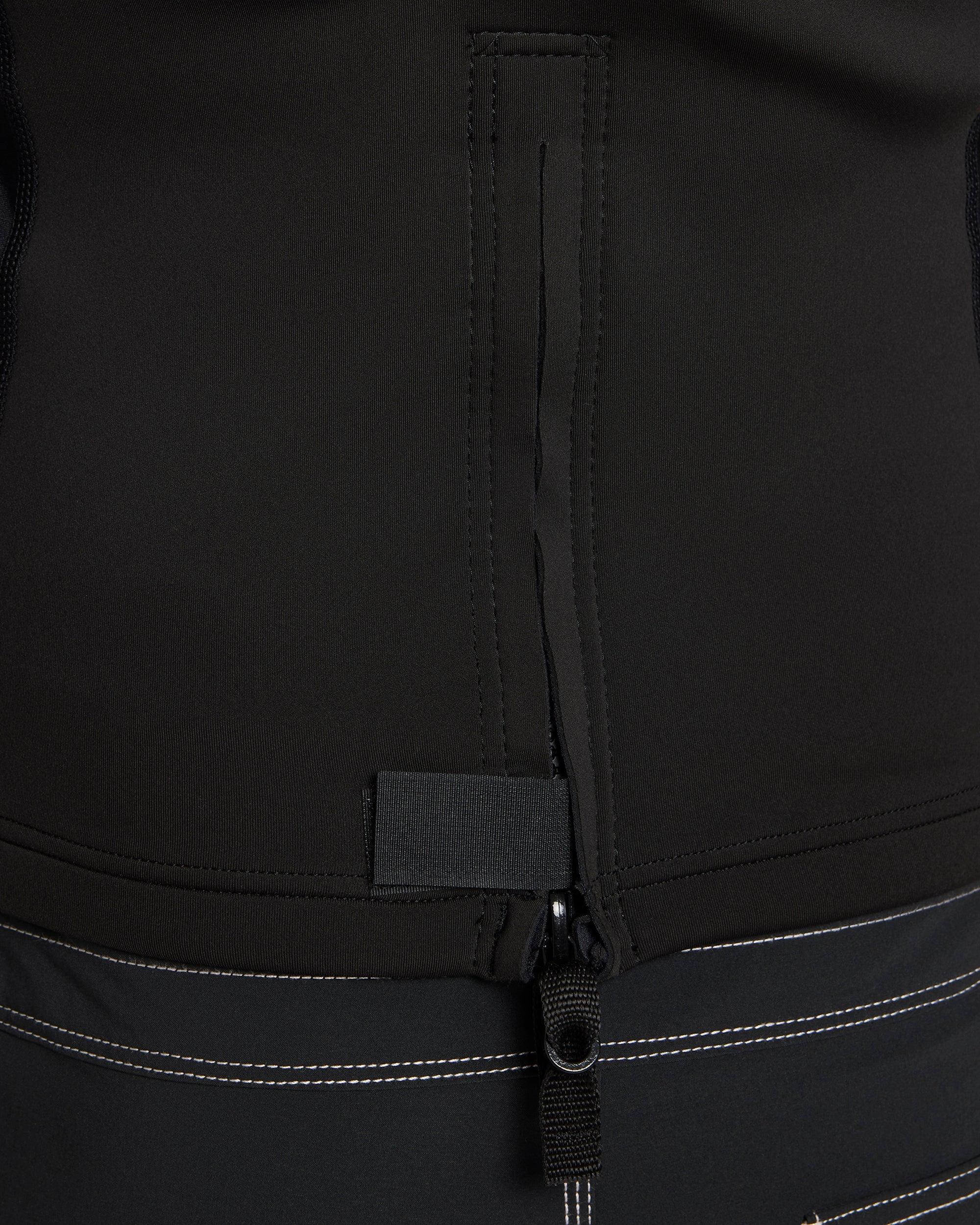 Detail of black wetsuit logo