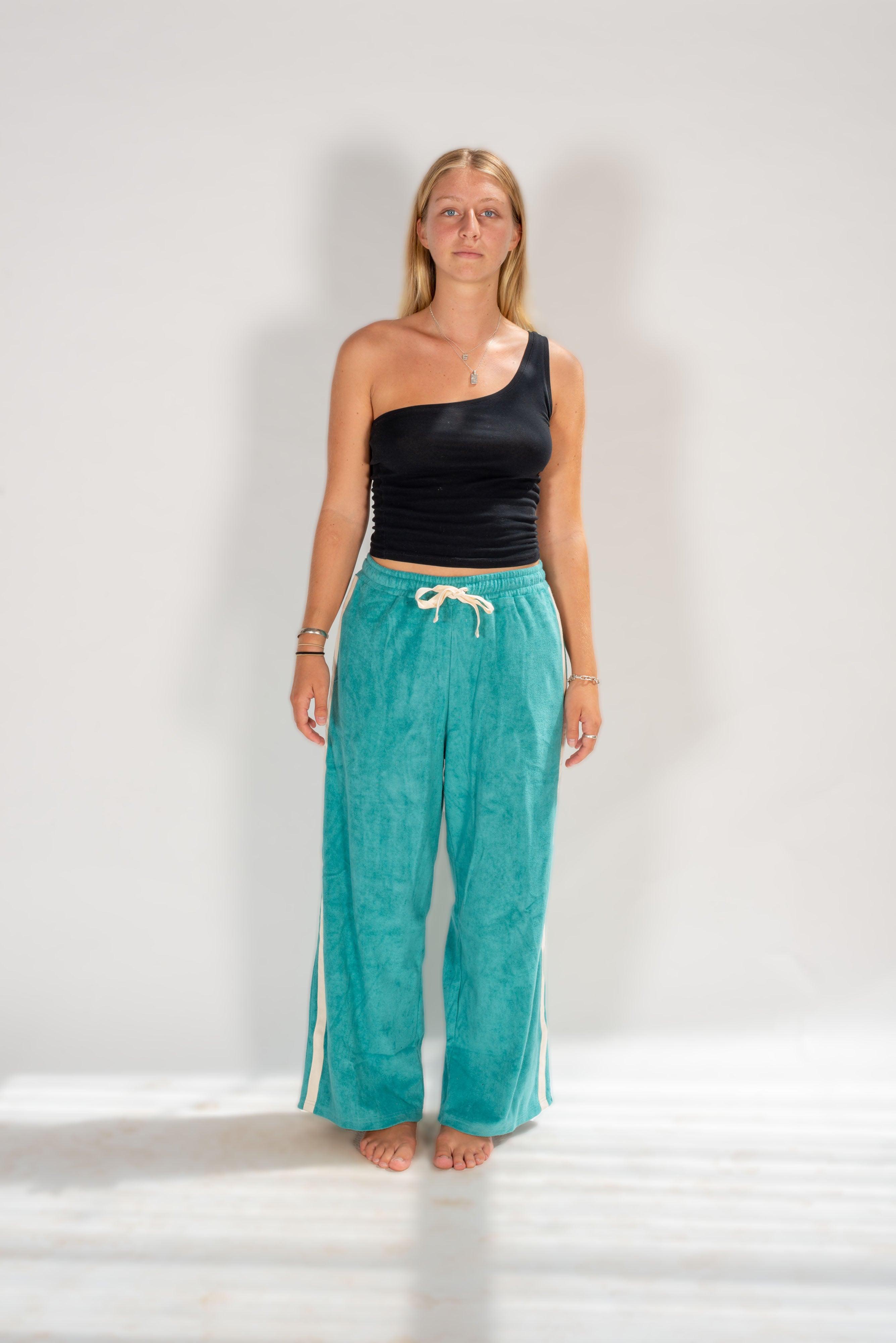 Model side view in pants outdoors