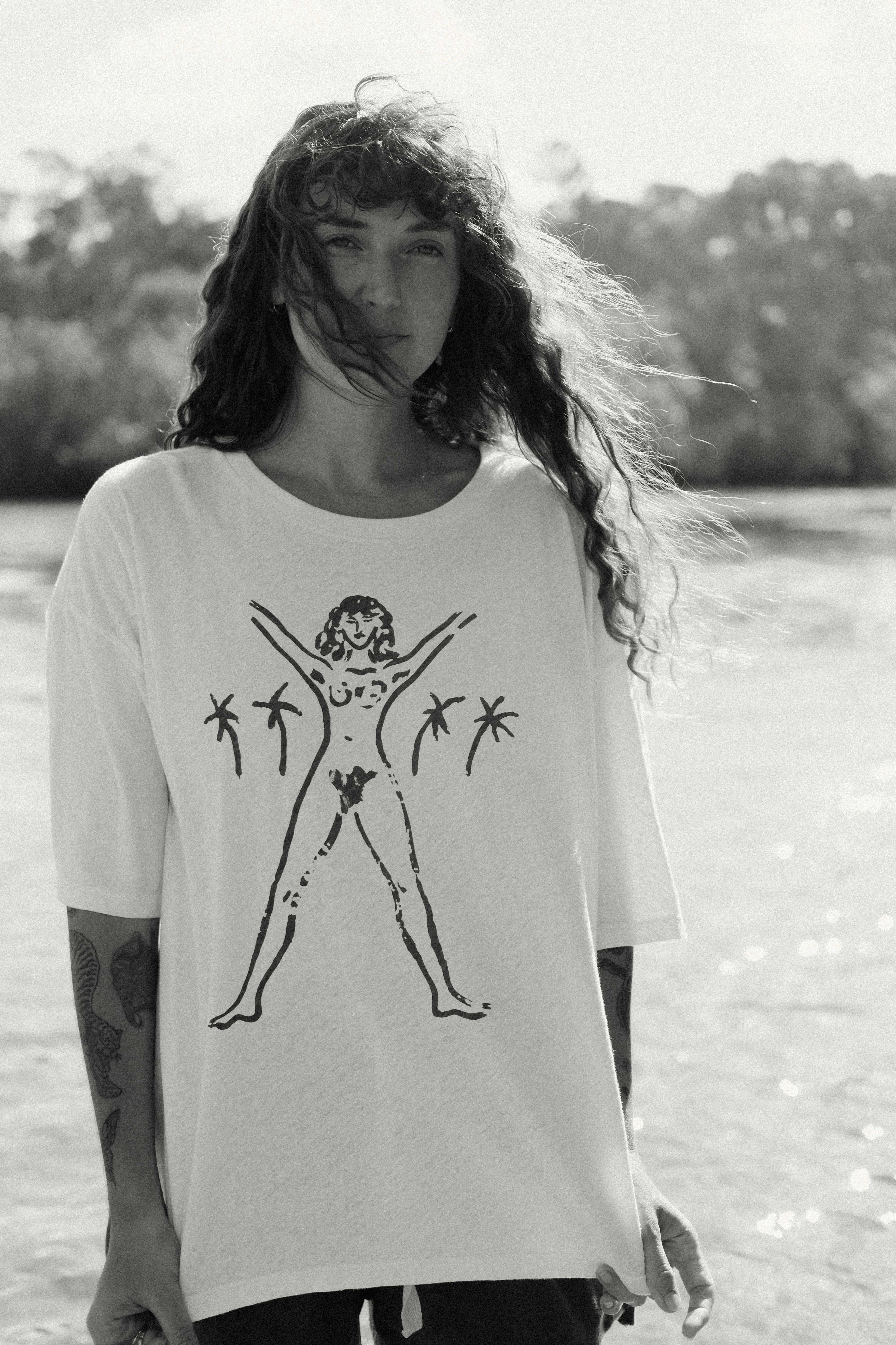 Model in Bush Woman Tee outdoors