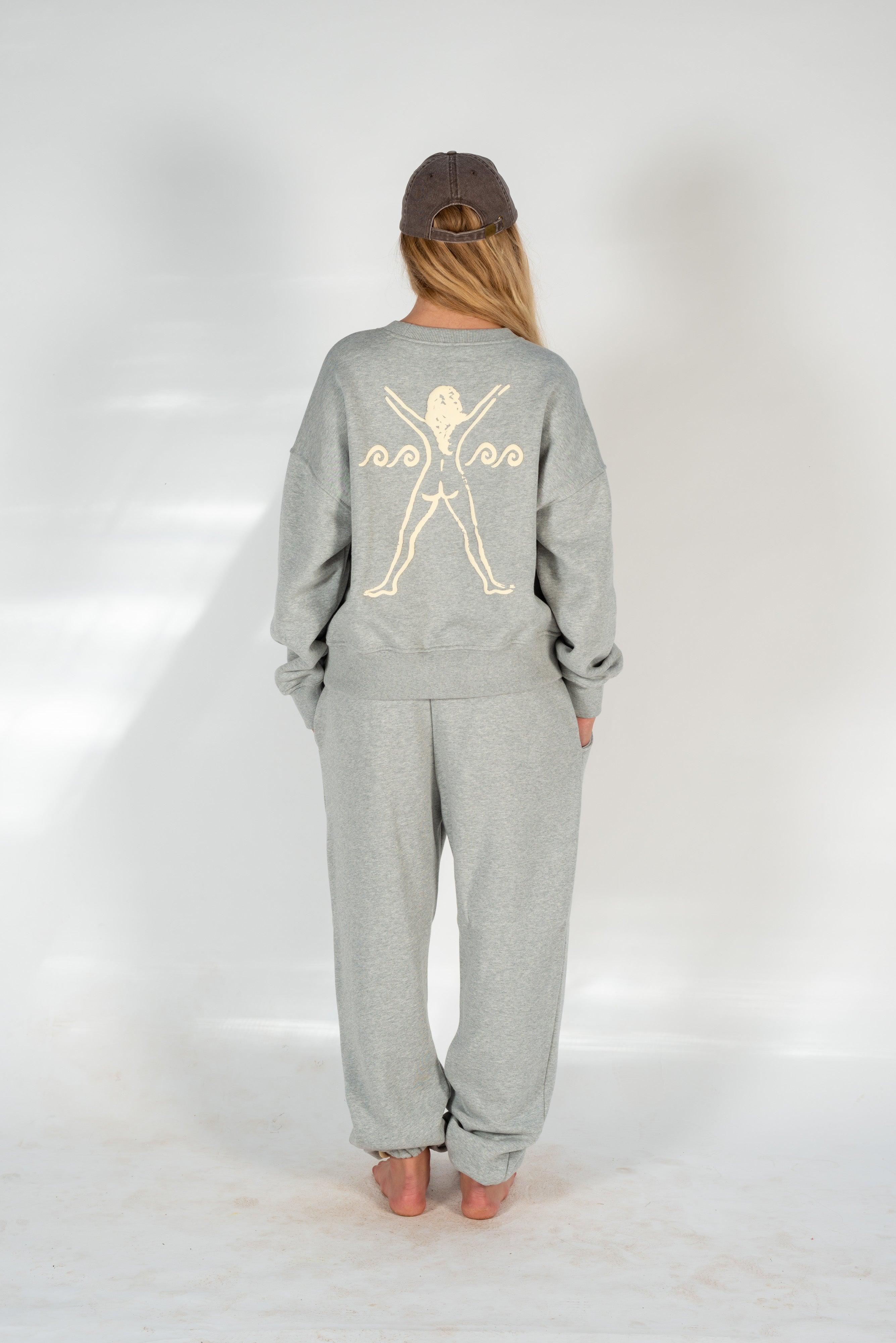 Model leaning in Bush Woman Track Pant