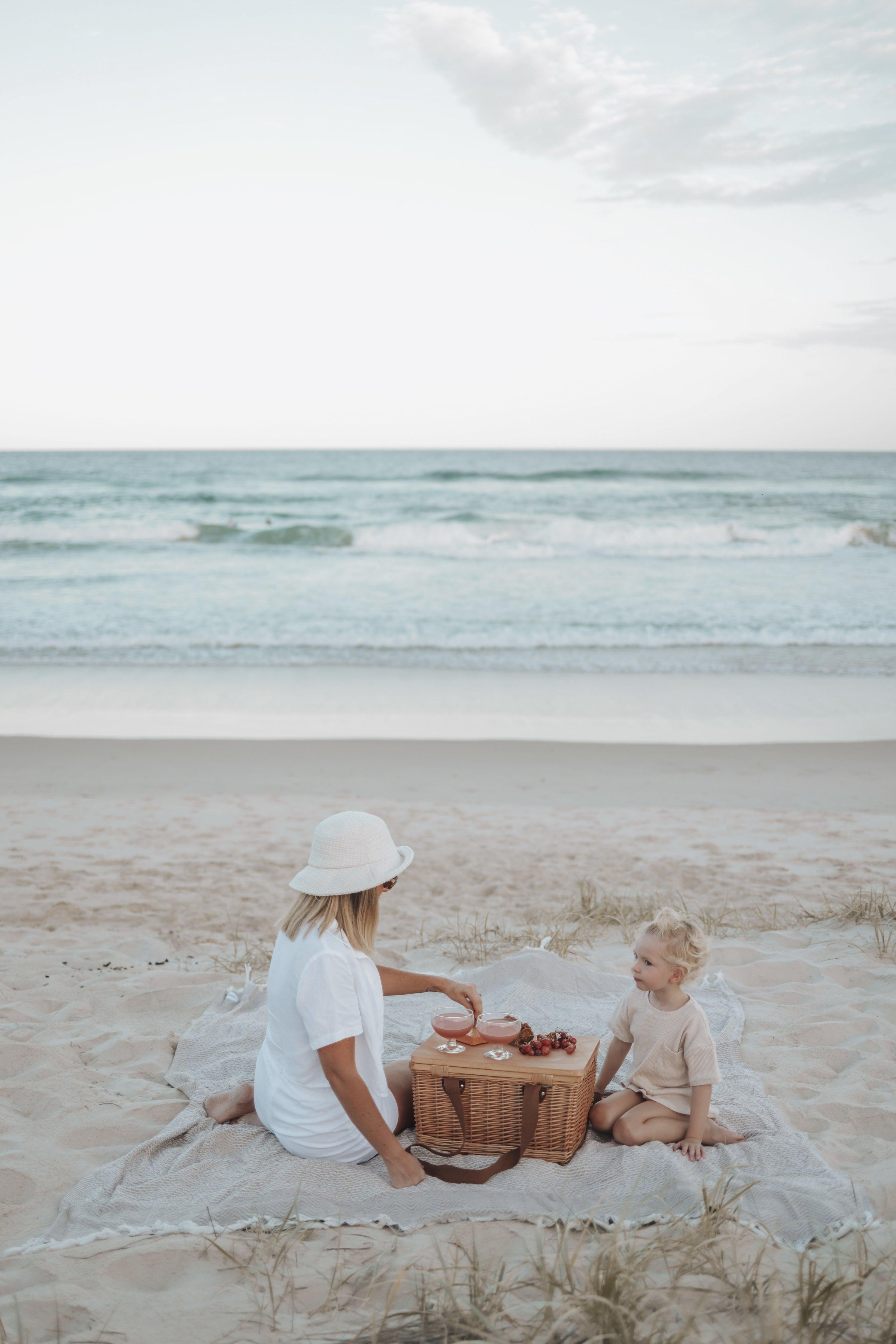 Diamond family blanket on beach