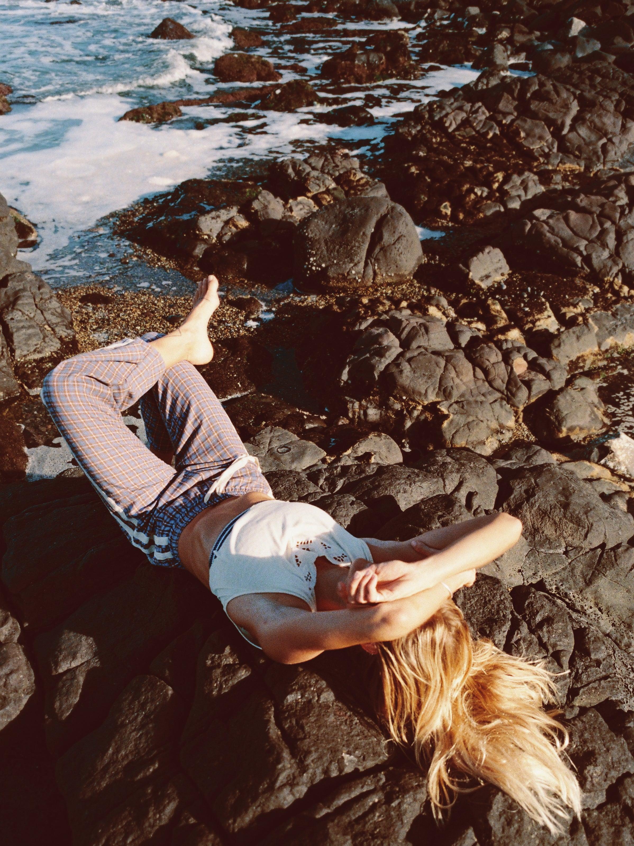 Flannel pants on rocks portrait