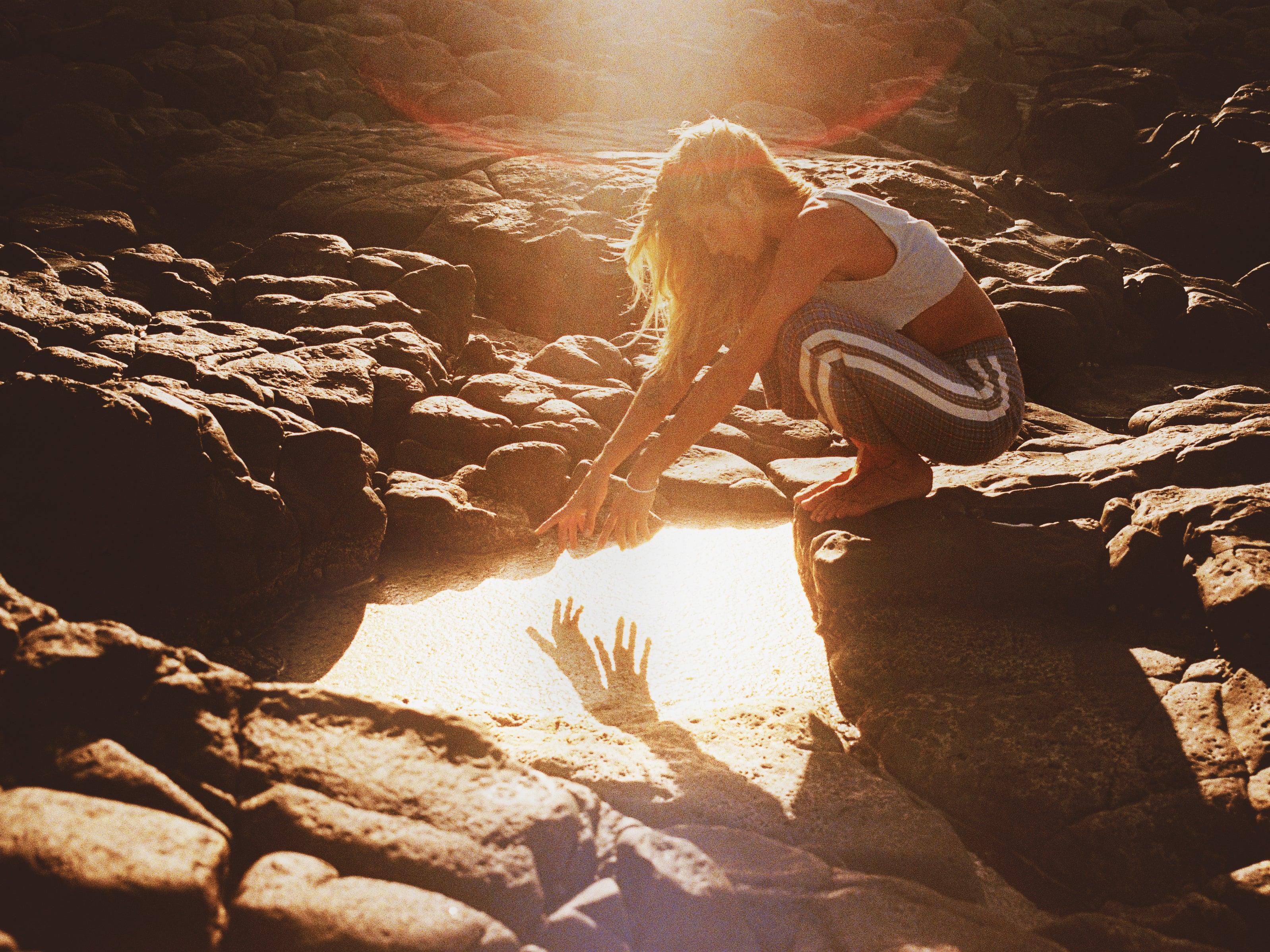 Flannel pants on rocks with sun