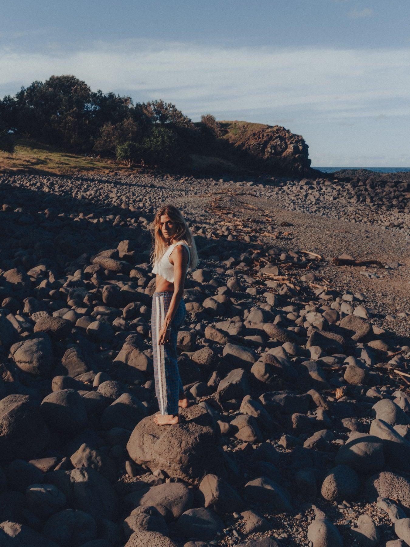 Flannel pants on rocks landscape