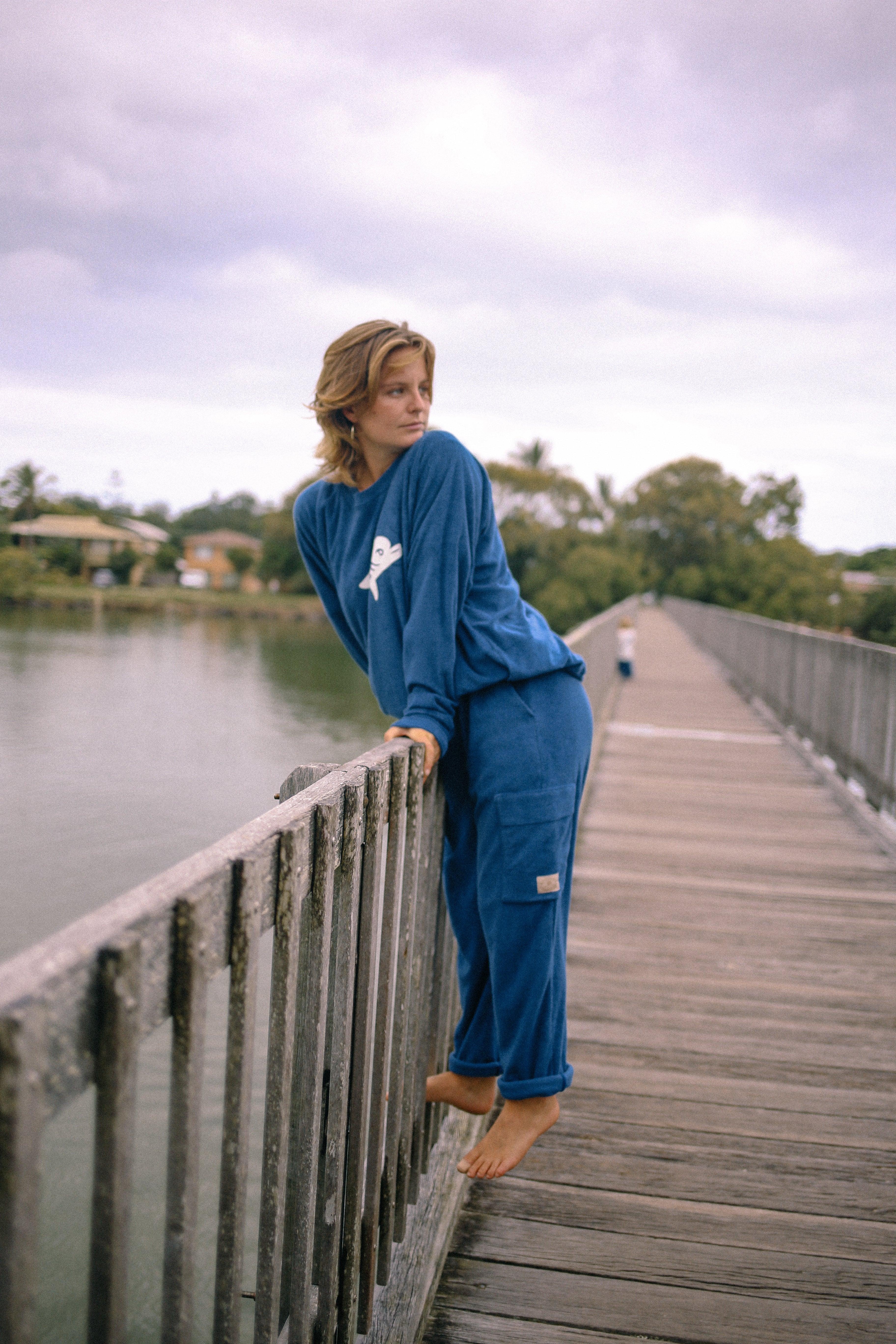 Sweater leaning on bridge