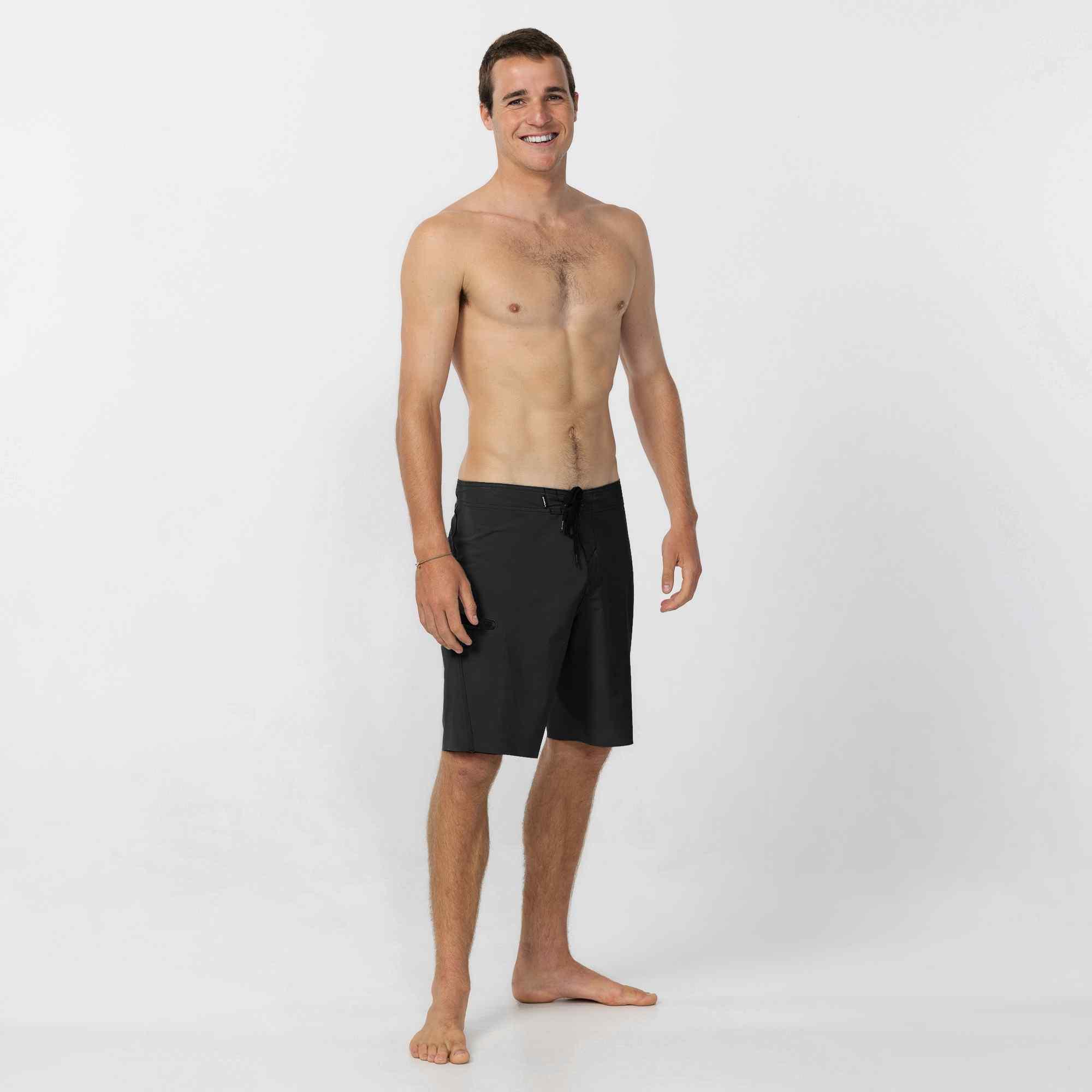 Model wearing Black Boardshorts
