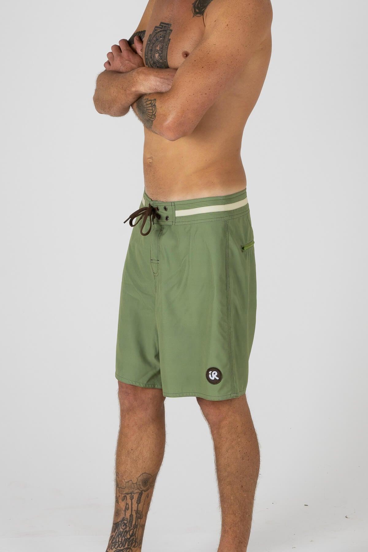 Side view of green trunks
