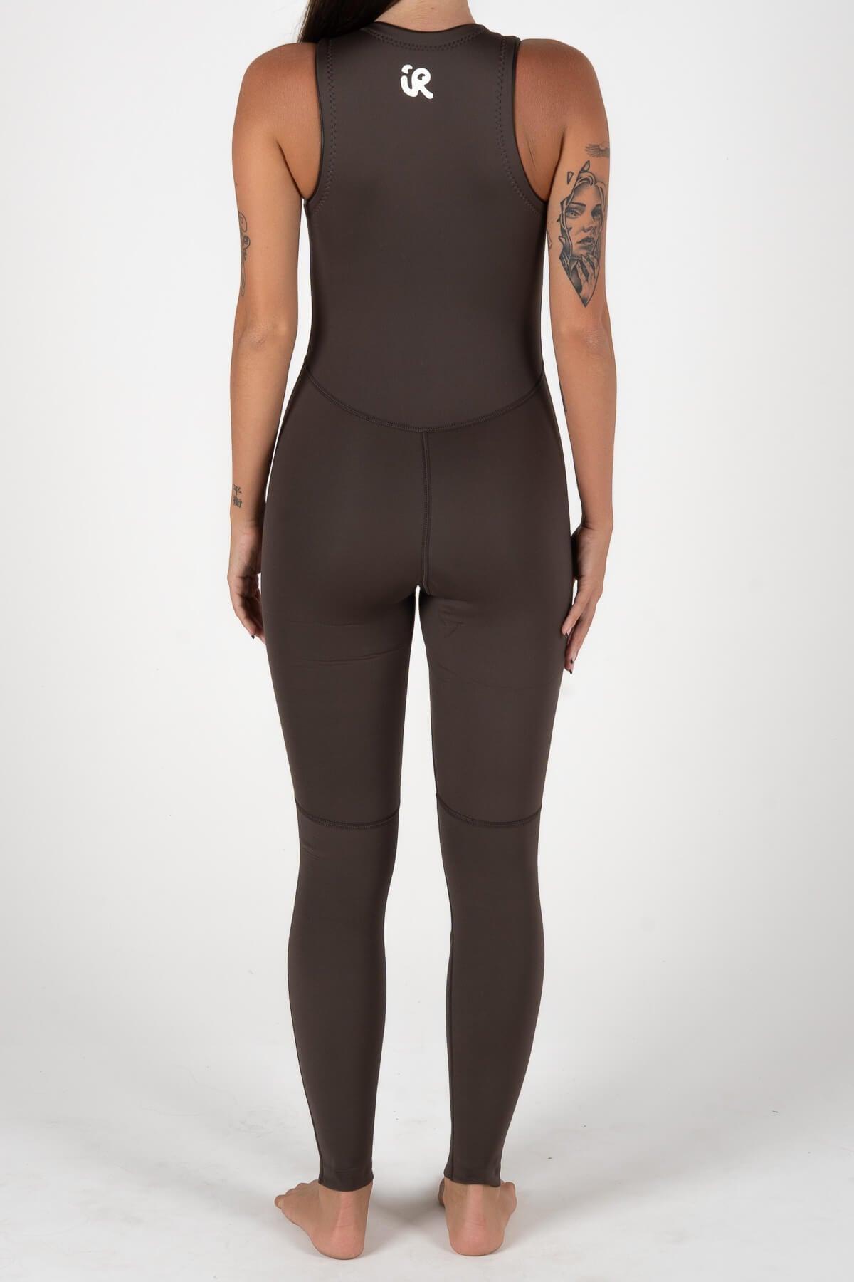Wetsuit on sand with board