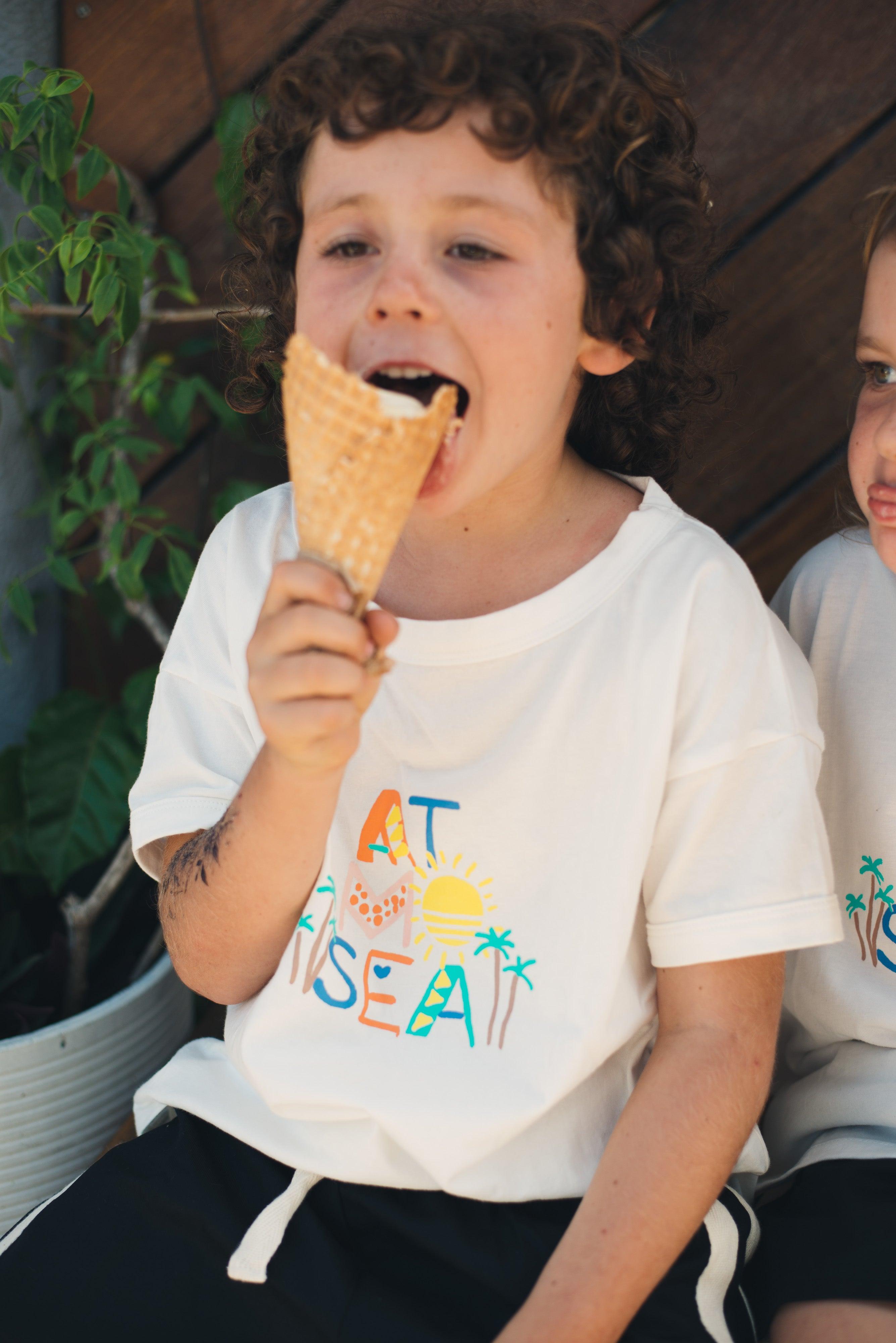 Child Eating Ice Cream in Tee