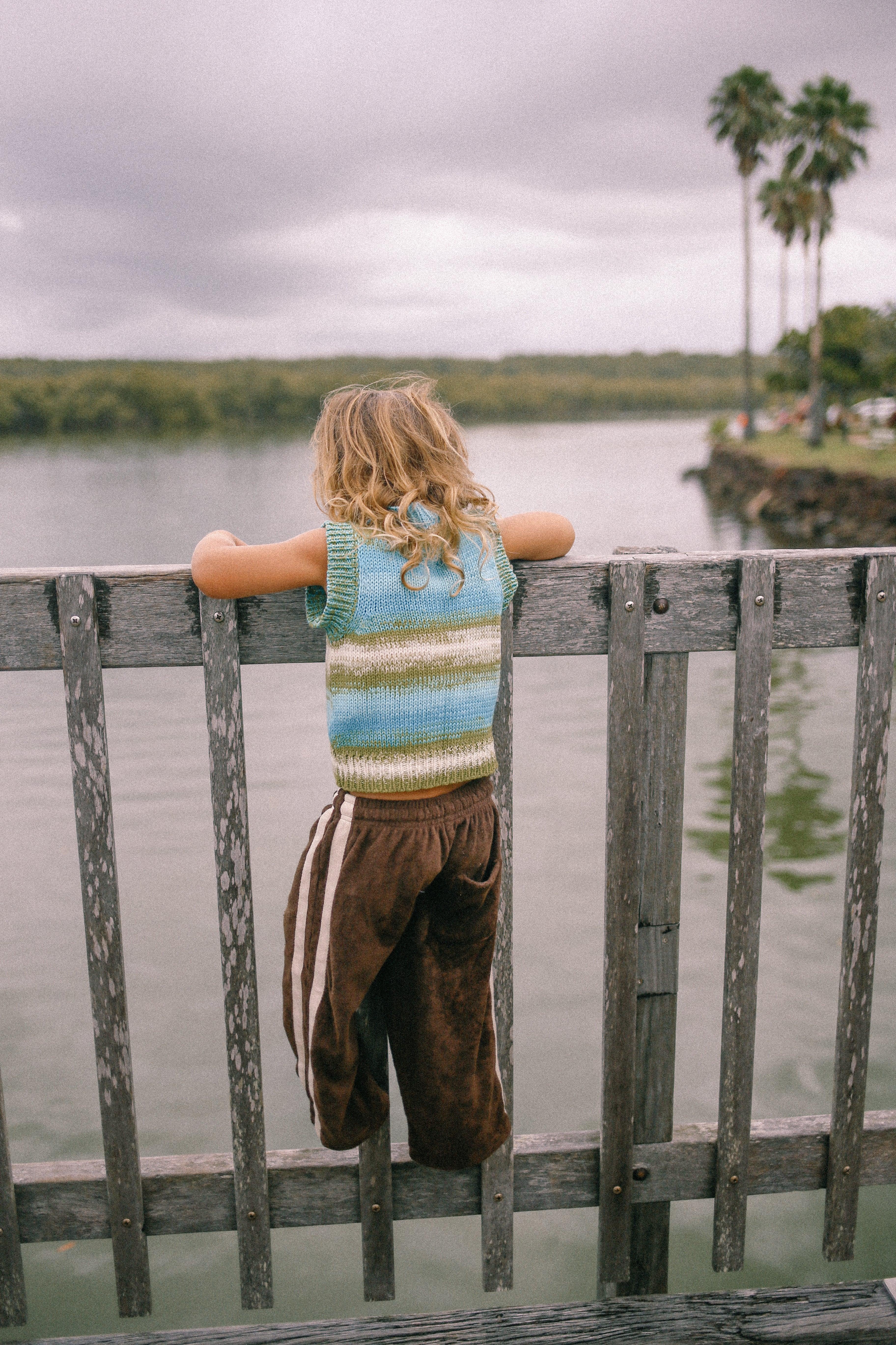Two children by water