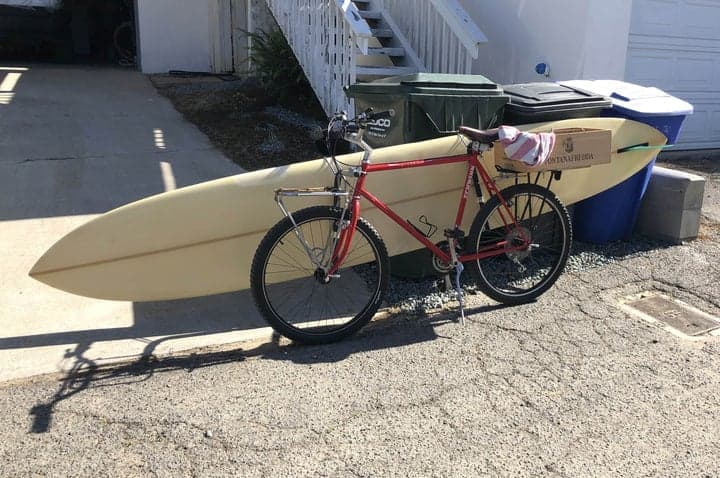 moved by bikes surfboard bike rack - longboard on a bike