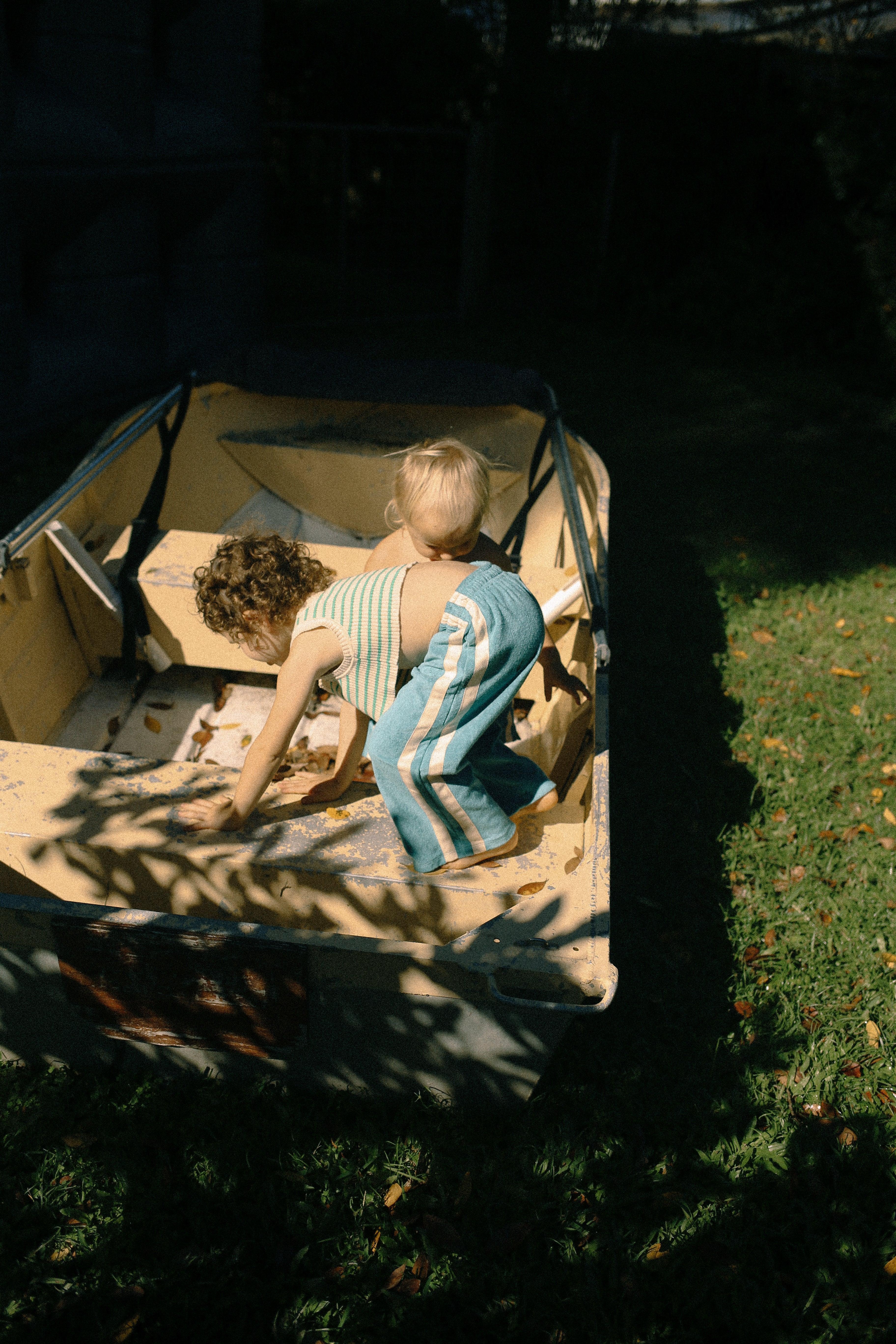 Kids exploring in boat