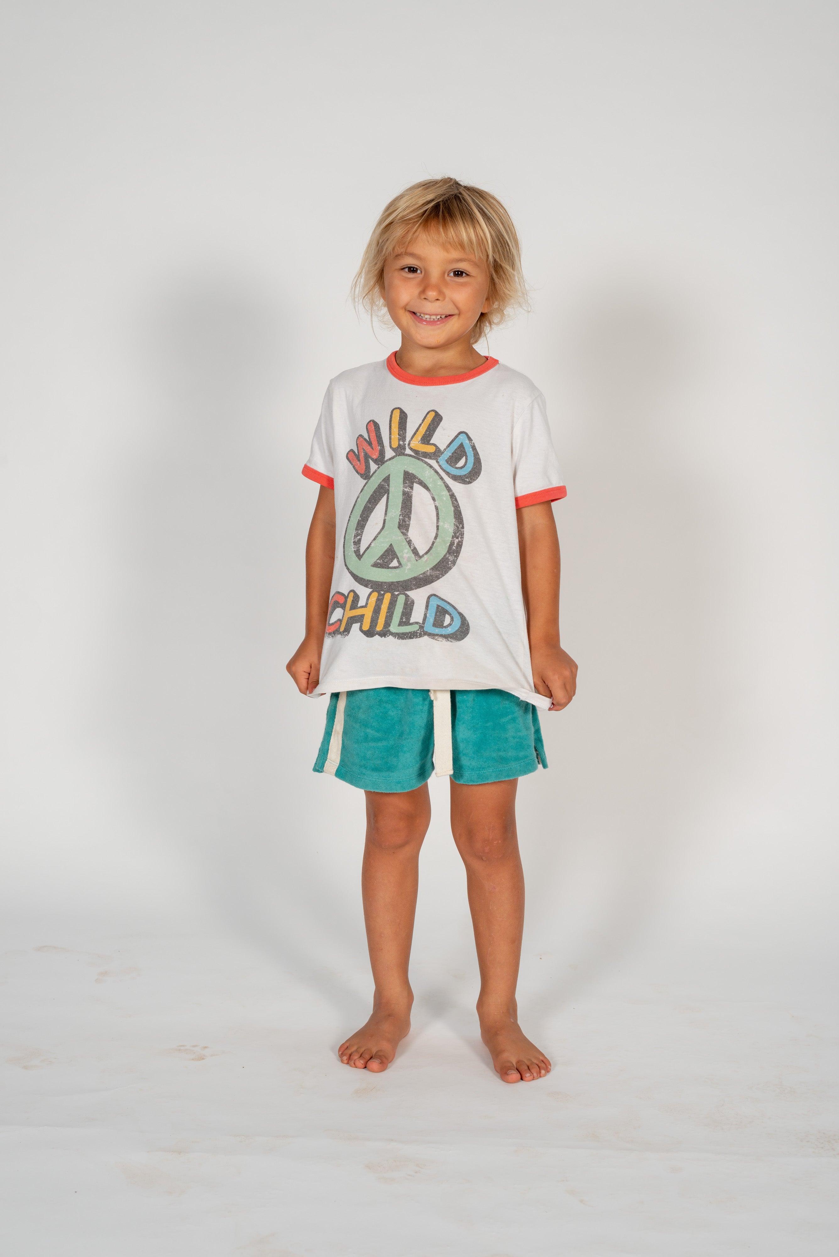 Child kicking in shorts