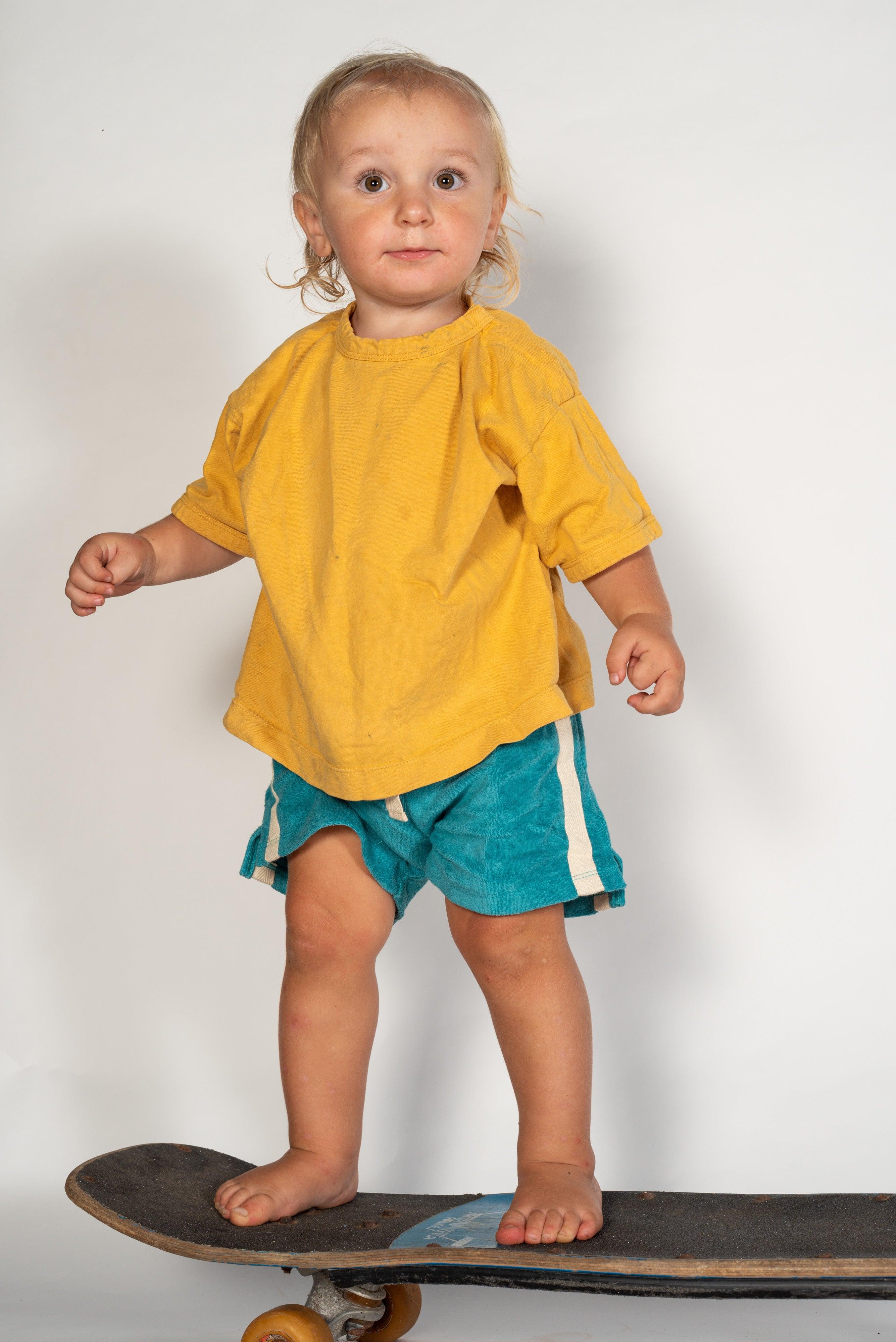 Child back view in shorts