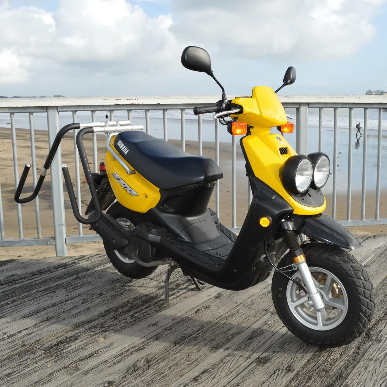 moved by bikes moped surfboard rack side