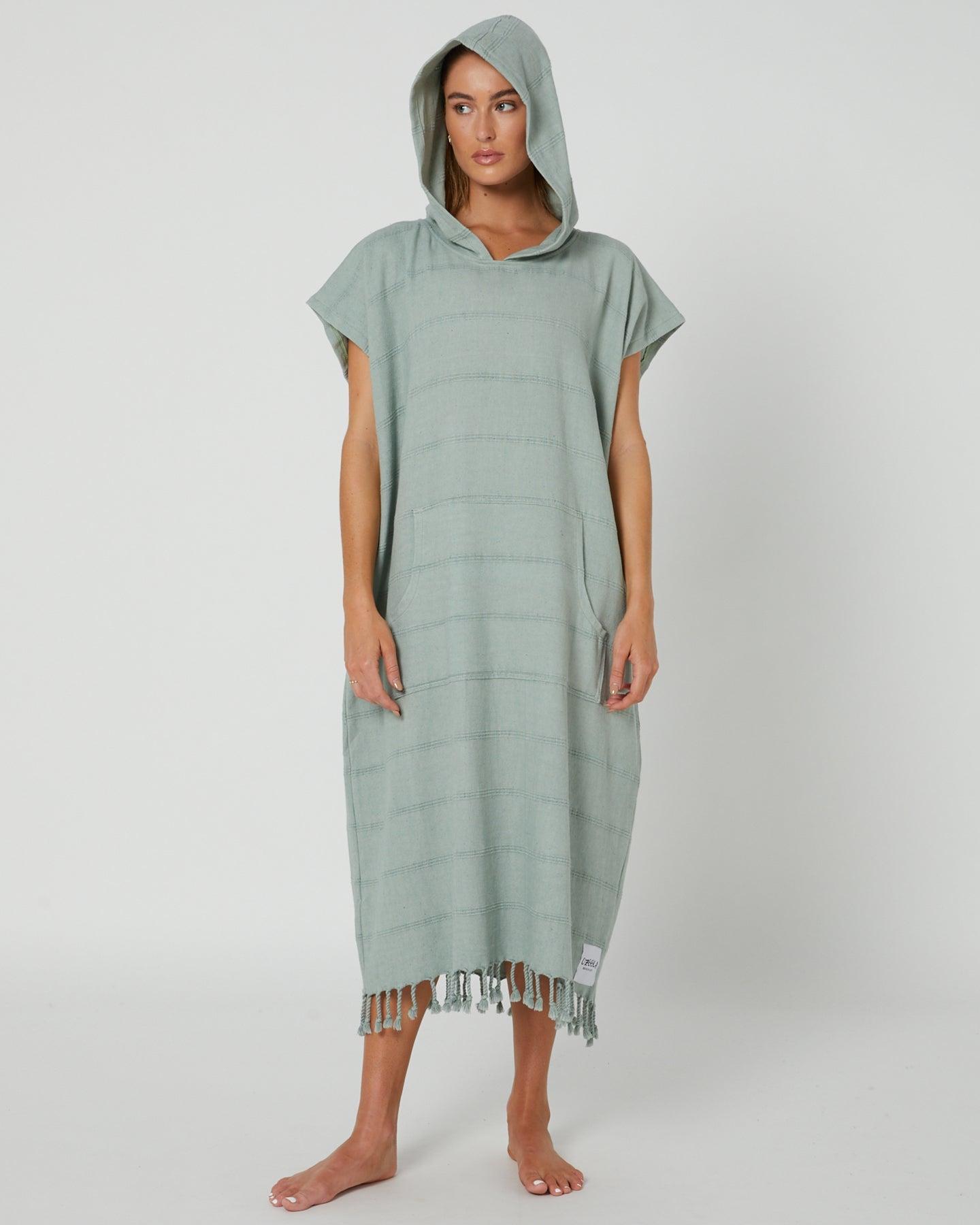 Model wearing poncho hood down