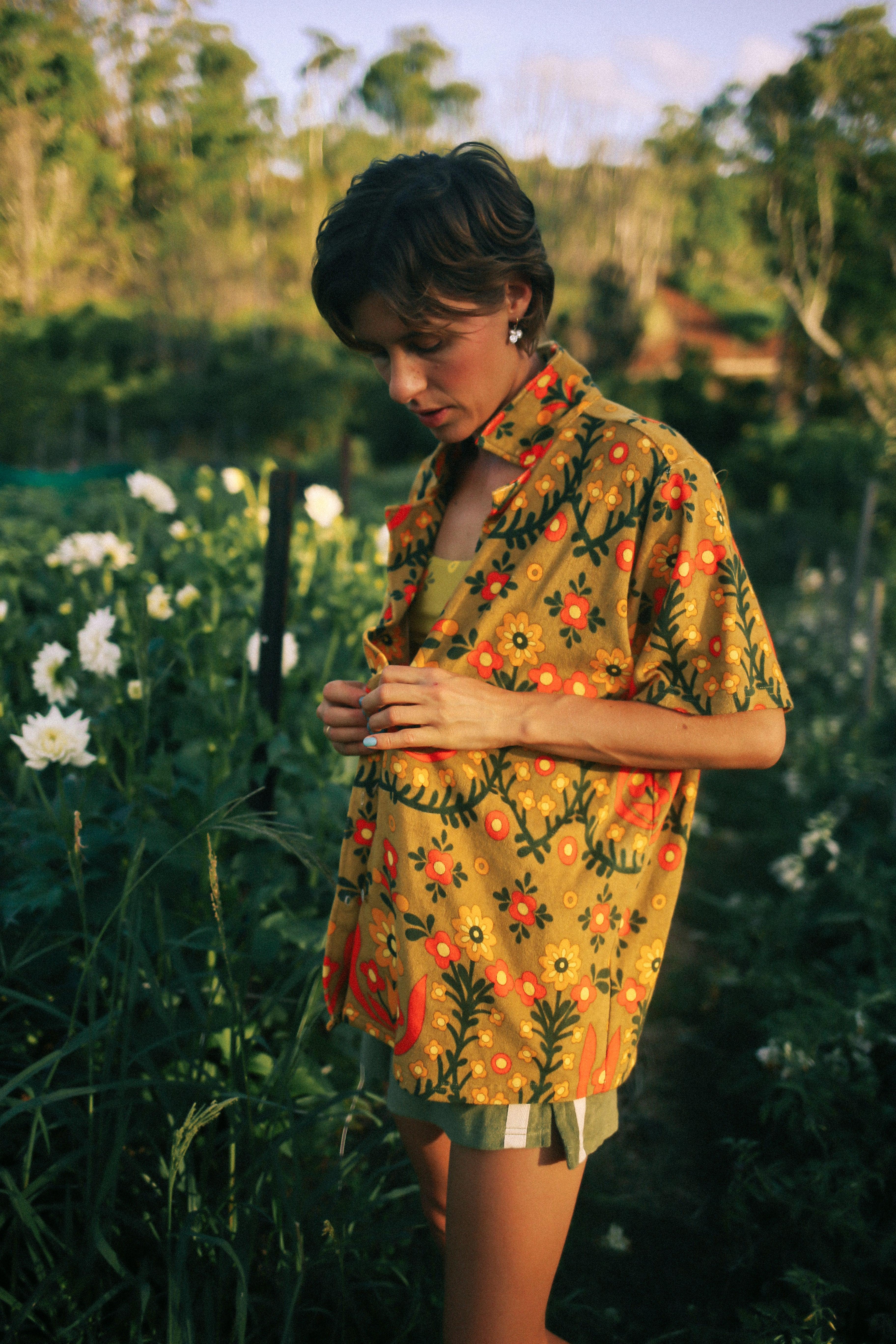 Shirt in garden with flowers