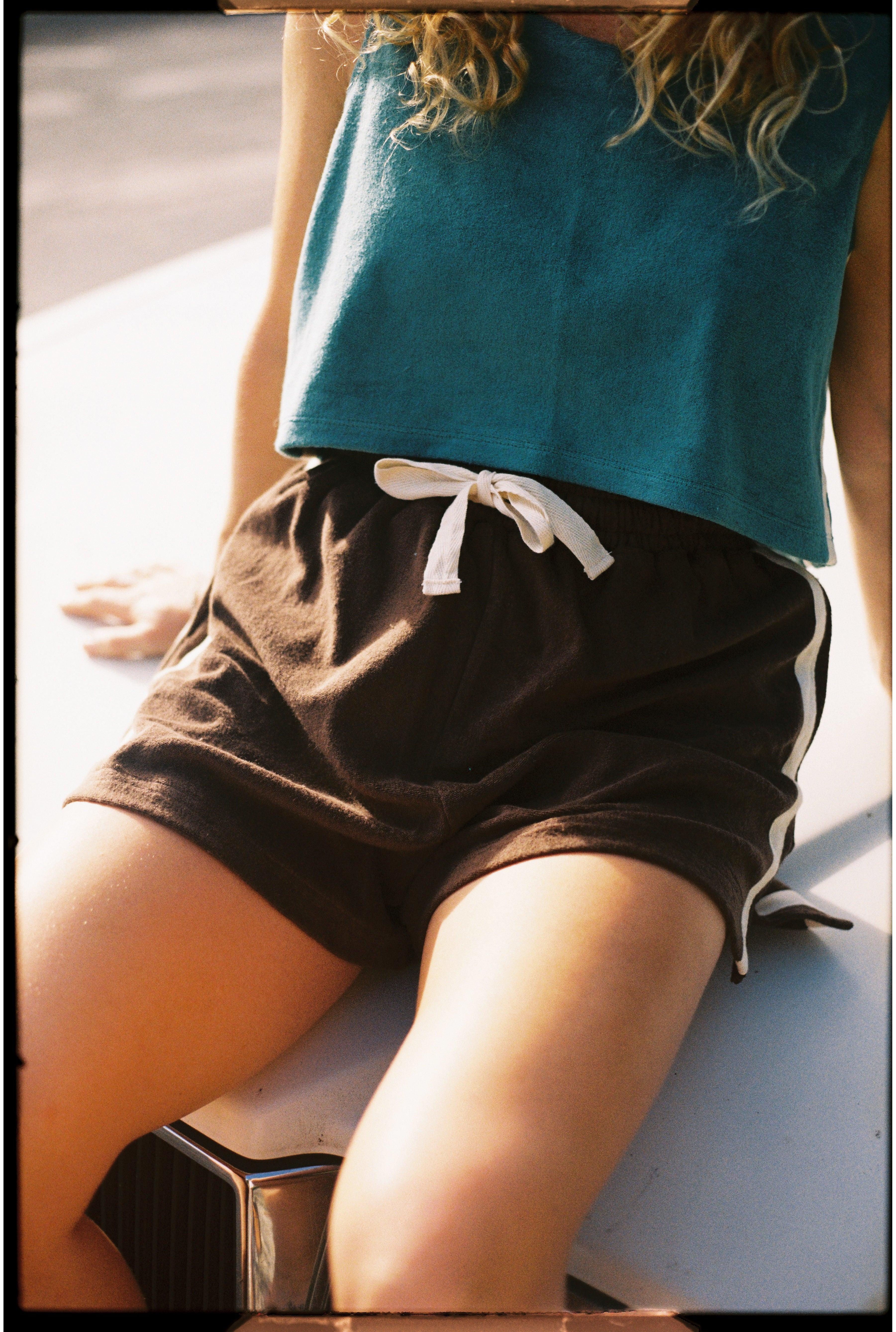Shorts close-up on car hood